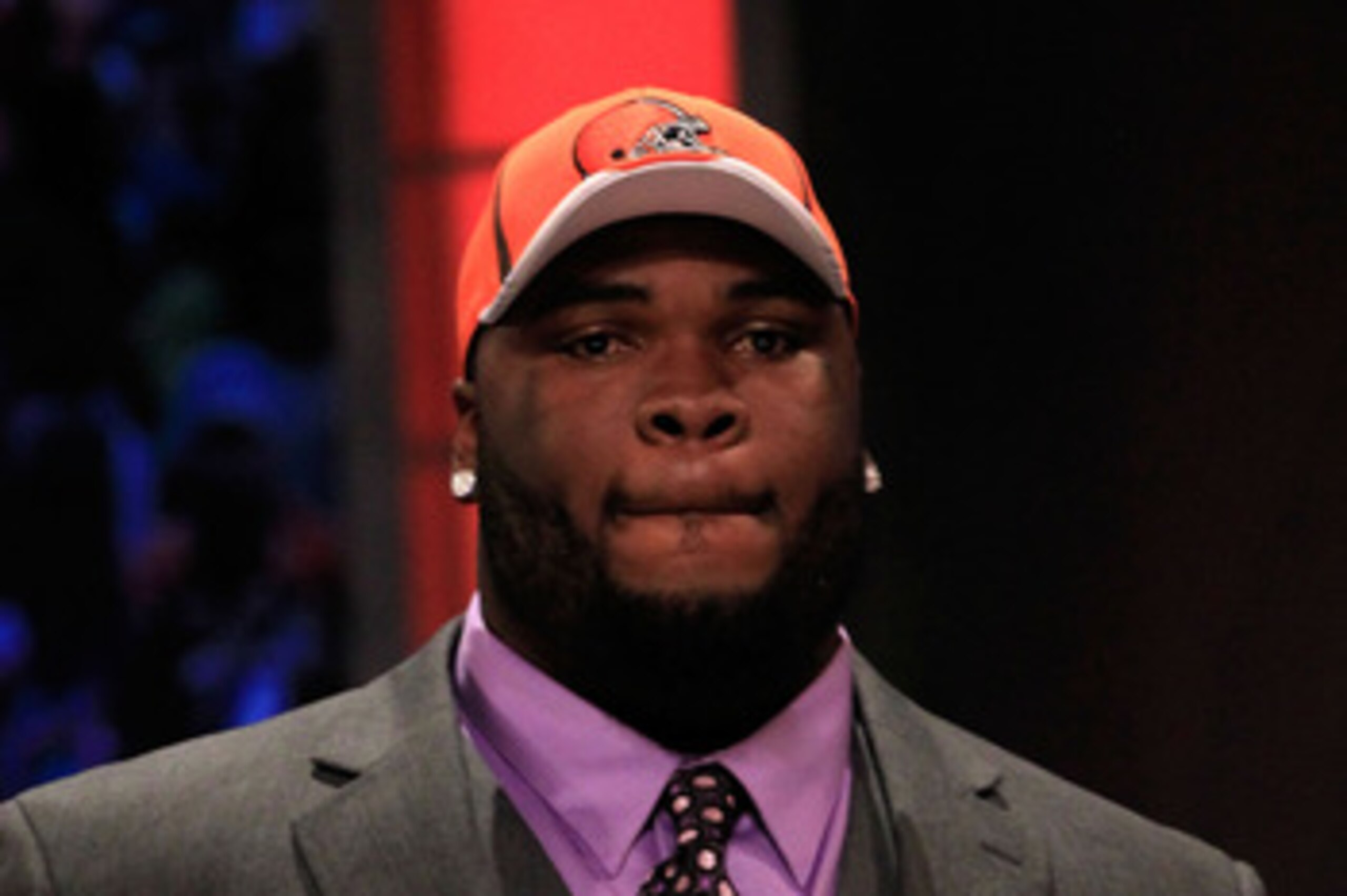 NEW YORK, NY - APRIL 28:  Phil Taylor, #21 overall pick by the Cleveland Browns, holds up a jersey on stage during the 2011 NFL Draft at Radio City Music Hall on April 28, 2011 in New York City.  (Photo by Chris Trotman/Getty Images)