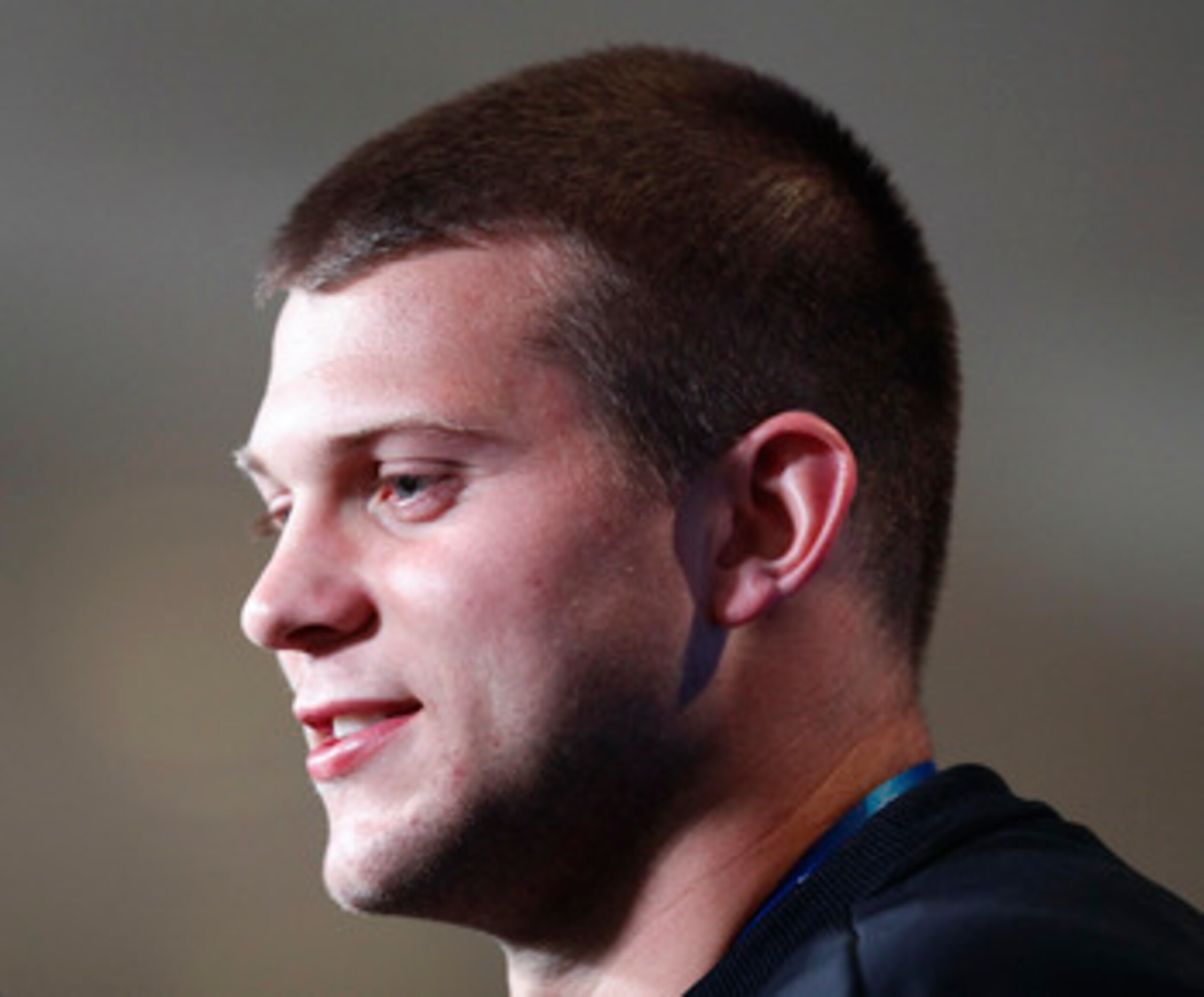 INDIANAPOLIS, IN - FEBRUARY 25: Washington Huskies quarterback Jake Locker answers questions during a media session at the 2011 NFL Scouting Combine at Lucas Oil Stadium on February 25, 2011 in Indianapolis, Indiana. (Photo by Joe Robbins/Getty Images)