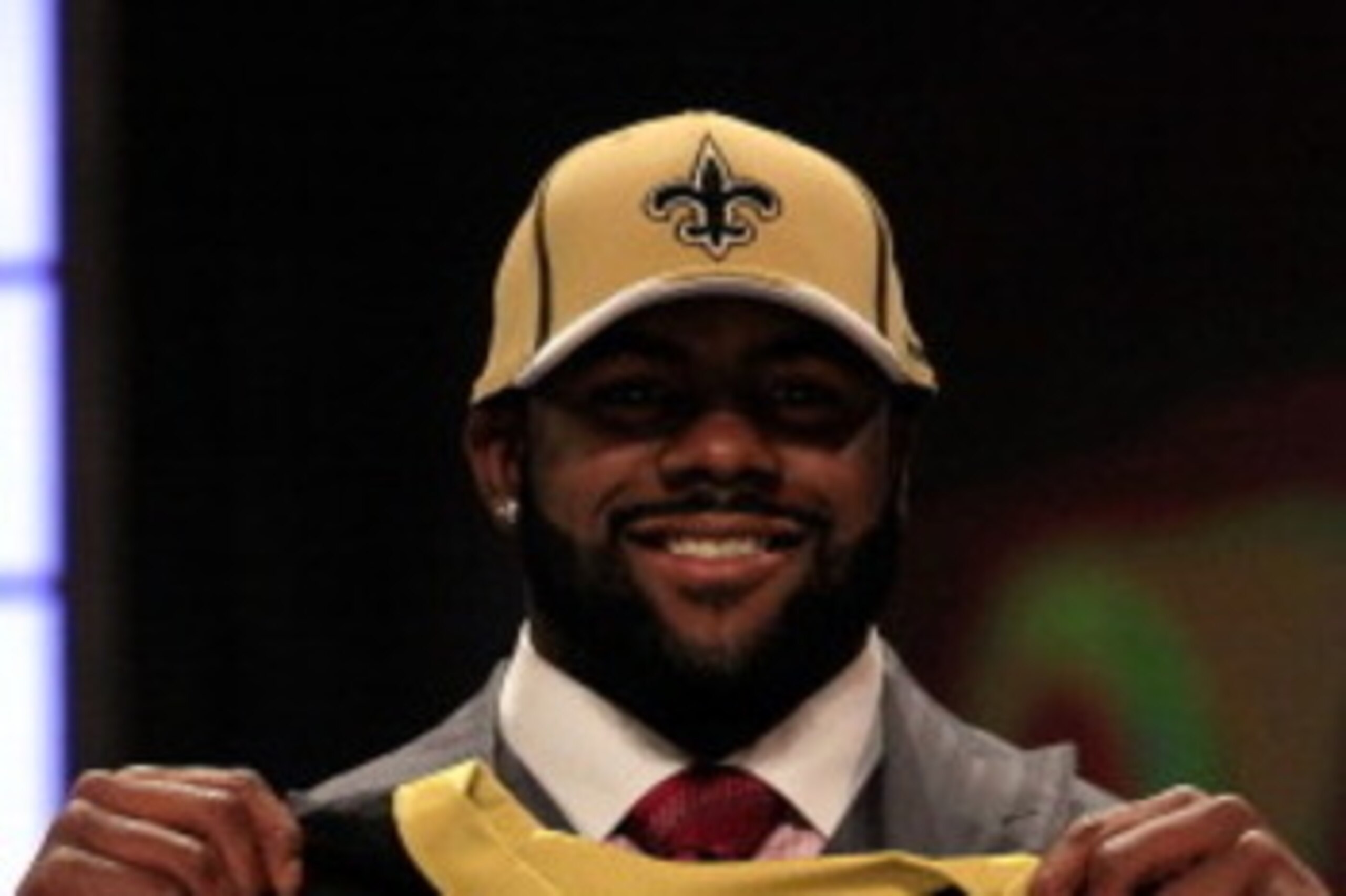 NEW YORK, NY - APRIL 28:  Mark Ingram, #28 overall pick by the New Orleans Saints, holds up a jersey on stage during the 2011 NFL Draft at Radio City Music Hall on April 28, 2011 in New York City.  (Photo by Chris Trotman/Getty Images)