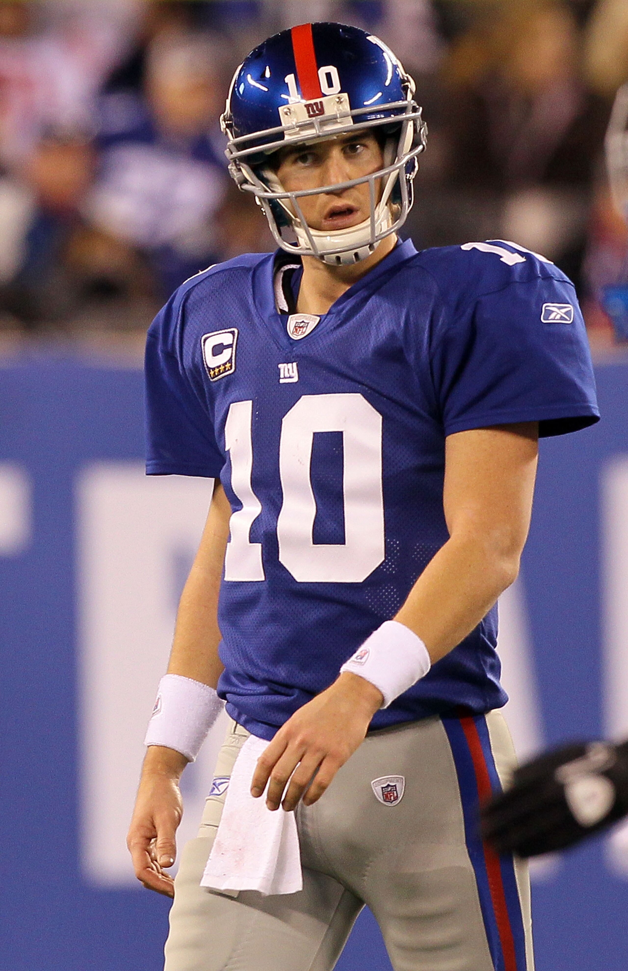 EAST RUTHERFORD, NJ - NOVEMBER 14:  Eli Manning #10 of the New York Giants walks off the field after losing the ball on a fumble in the fourth quarter against of the Dallas Cowboys on November 14, 2010 at the New Meadowlands Stadium in East Rutherford, Ne
