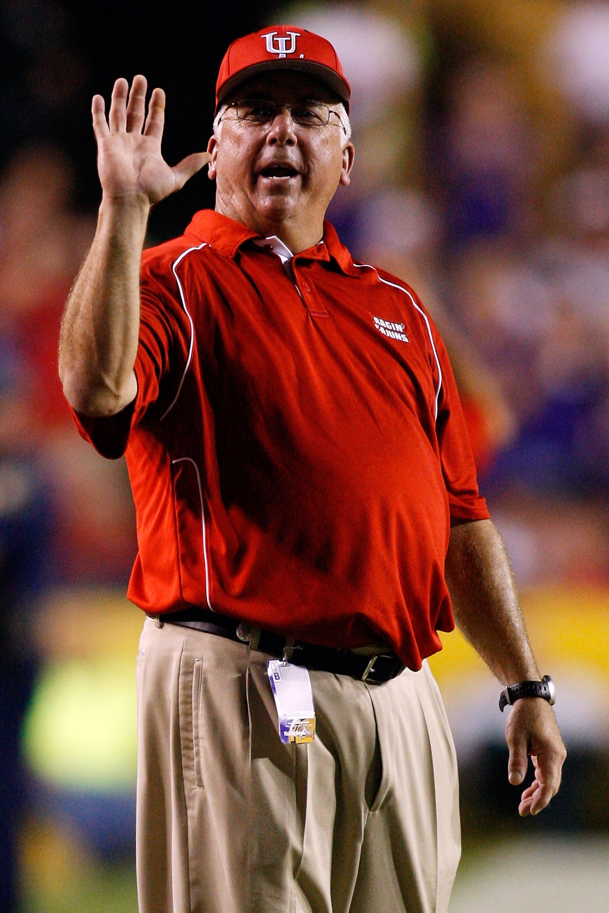 BATON ROUGE, LA - SEPTEMBER 19:  Head coach Rickey Bustle of the University of Louisiana-Lafatette Ragin' Cajuns calls a play against the Louisiana State University Tigers at Tiger Stadium on September 19, 2009 in Baton Rouge, Louisiana.  (Photo by Chris