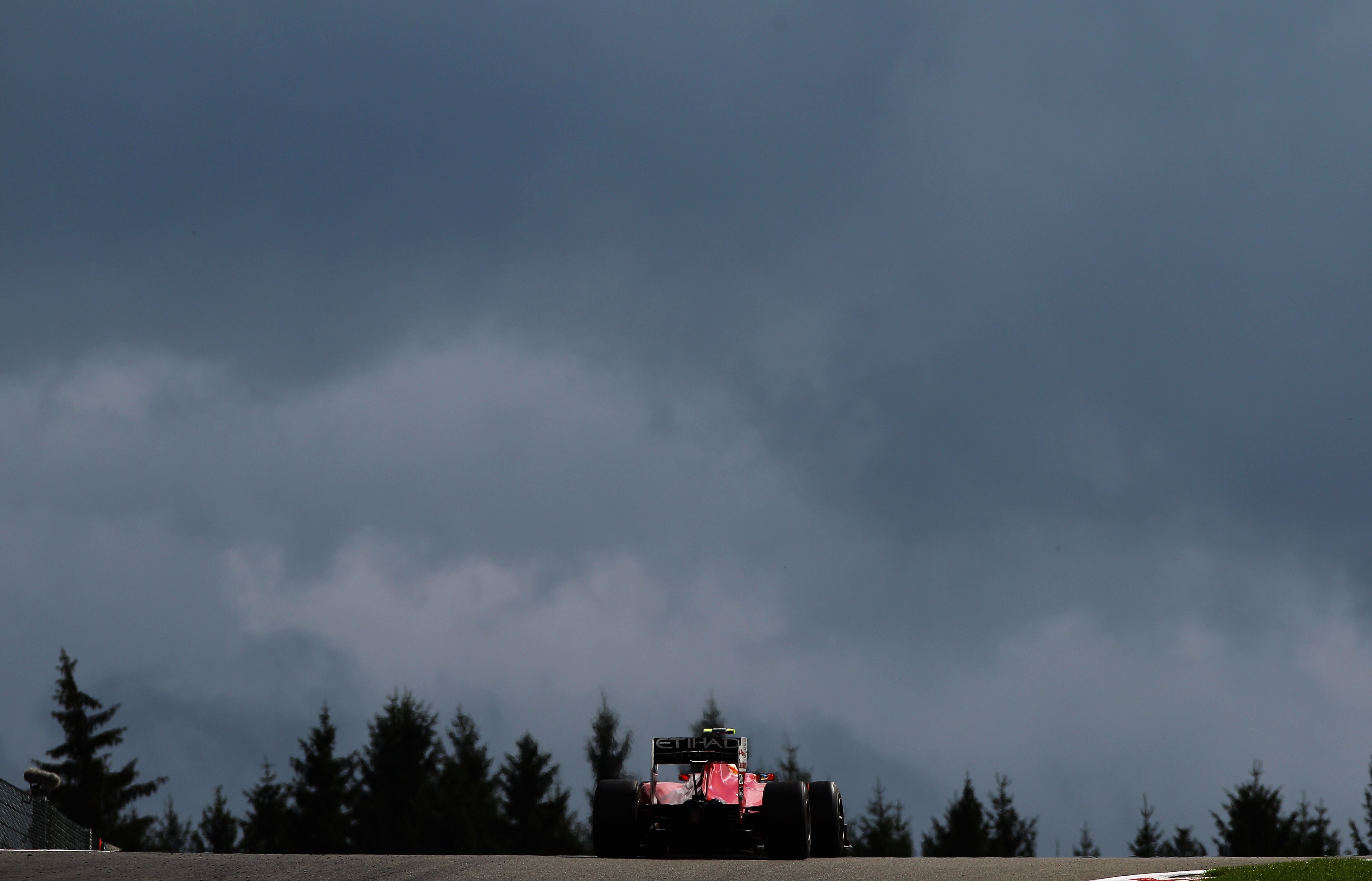 SPA FRANCORCHAMPS, BELGIUM - AUGUST 29:  Fernando Alonso of Spain and Ferrari drives during the Belgian Formula One Grand Prix at the Circuit of Spa Francorchamps on August 29, 2010 in Spa Francorchamps, Belgium.  (Photo by Paul Gilham/Getty Images)