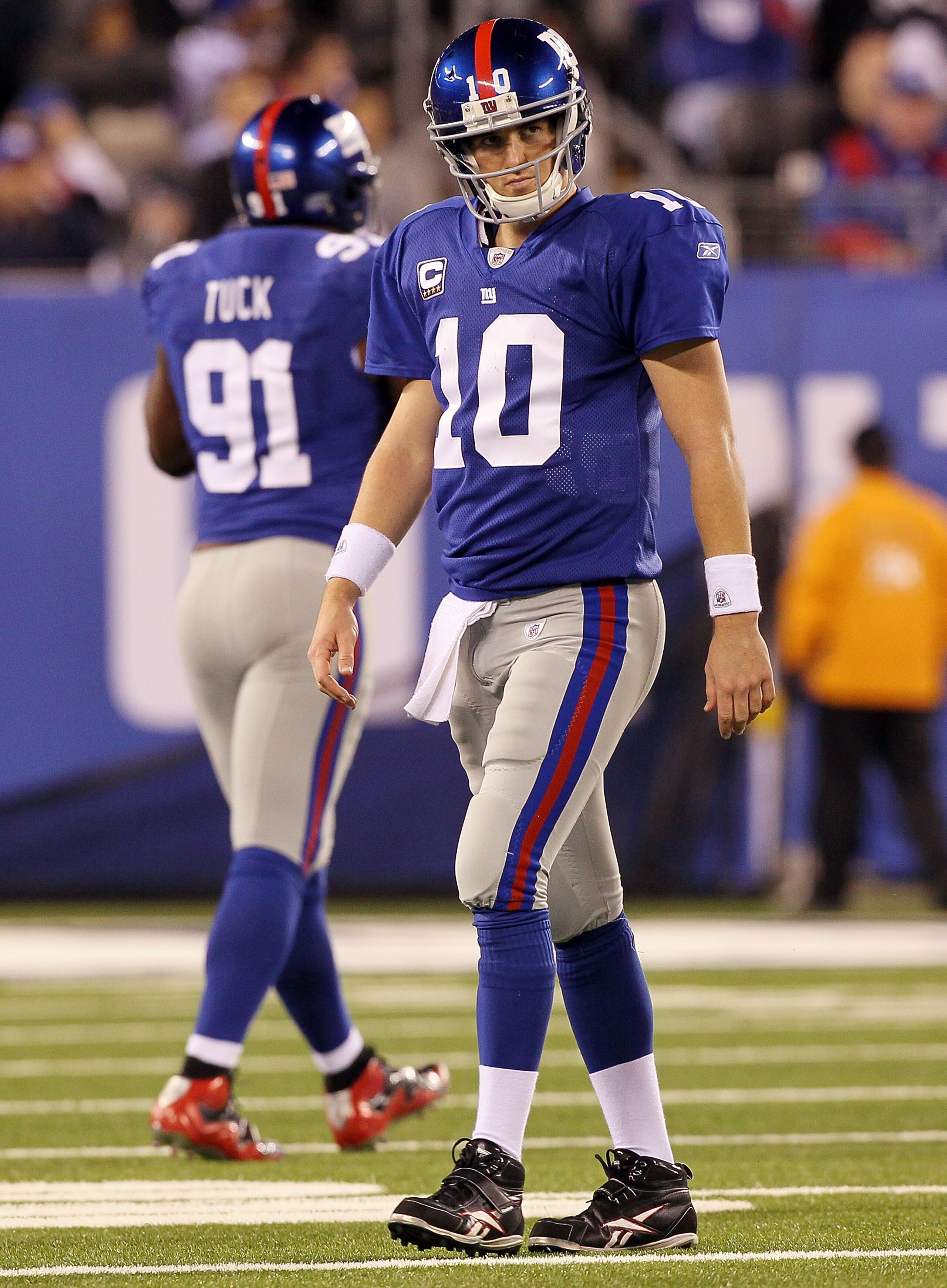 EAST RUTHERFORD, NJ - NOVEMBER 14:  Eli Manning #10 of the New York Giants walks off the field after losing the ball on a fumble in the fourth quarter against of the Dallas Cowboys on November 14, 2010 at the New Meadowlands Stadium in East Rutherford, Ne