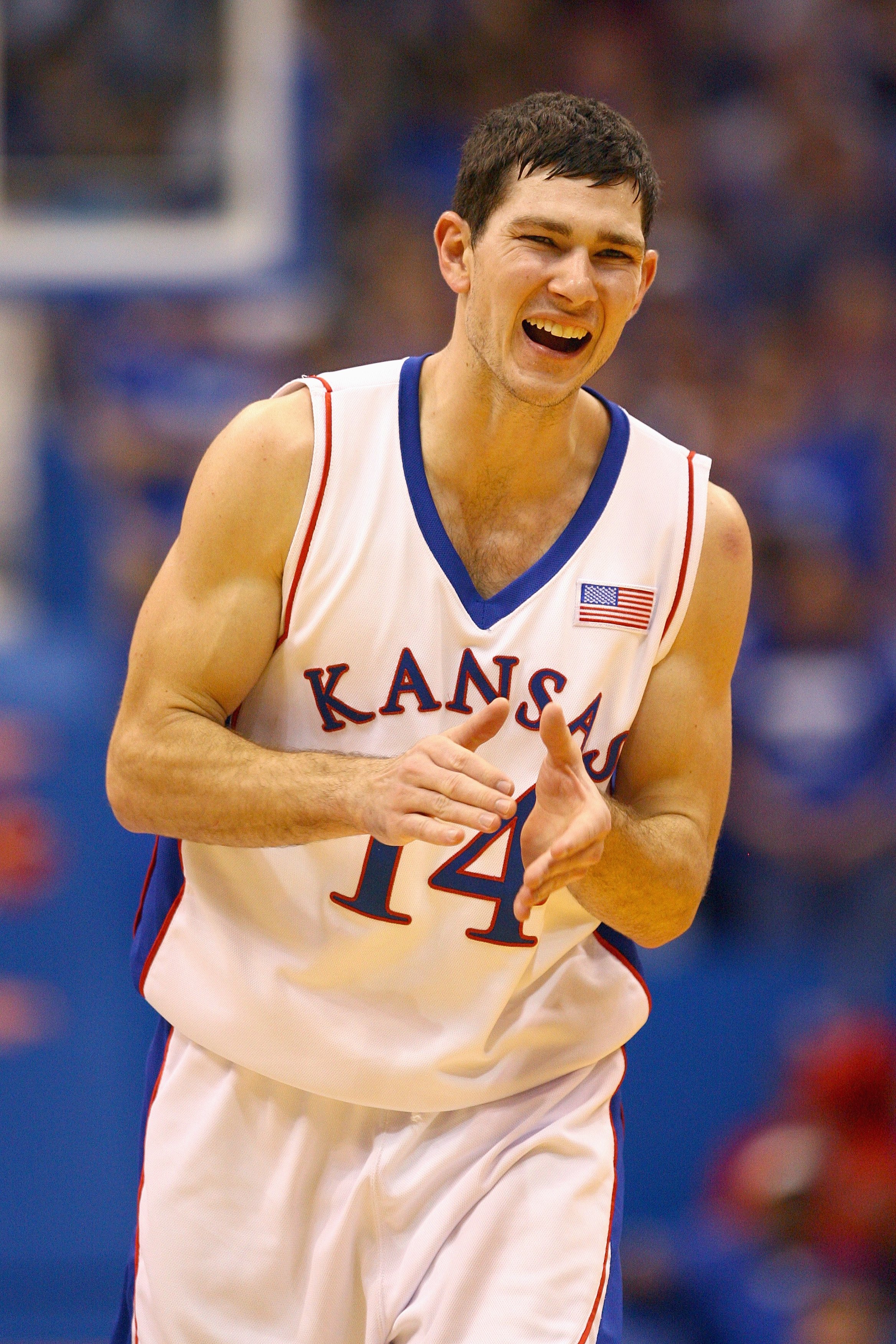 LAWRENCE, KS - NOVEMBER 25:  Tyrel Reed #14 of the Kansas Jayhawks celebrates during the game against the Oakland Golden Grizzlies on November 25, 2009 at Allen Fieldhouse in Lawrence, Kansas. (Photo by Jamie Squire/Getty Images)