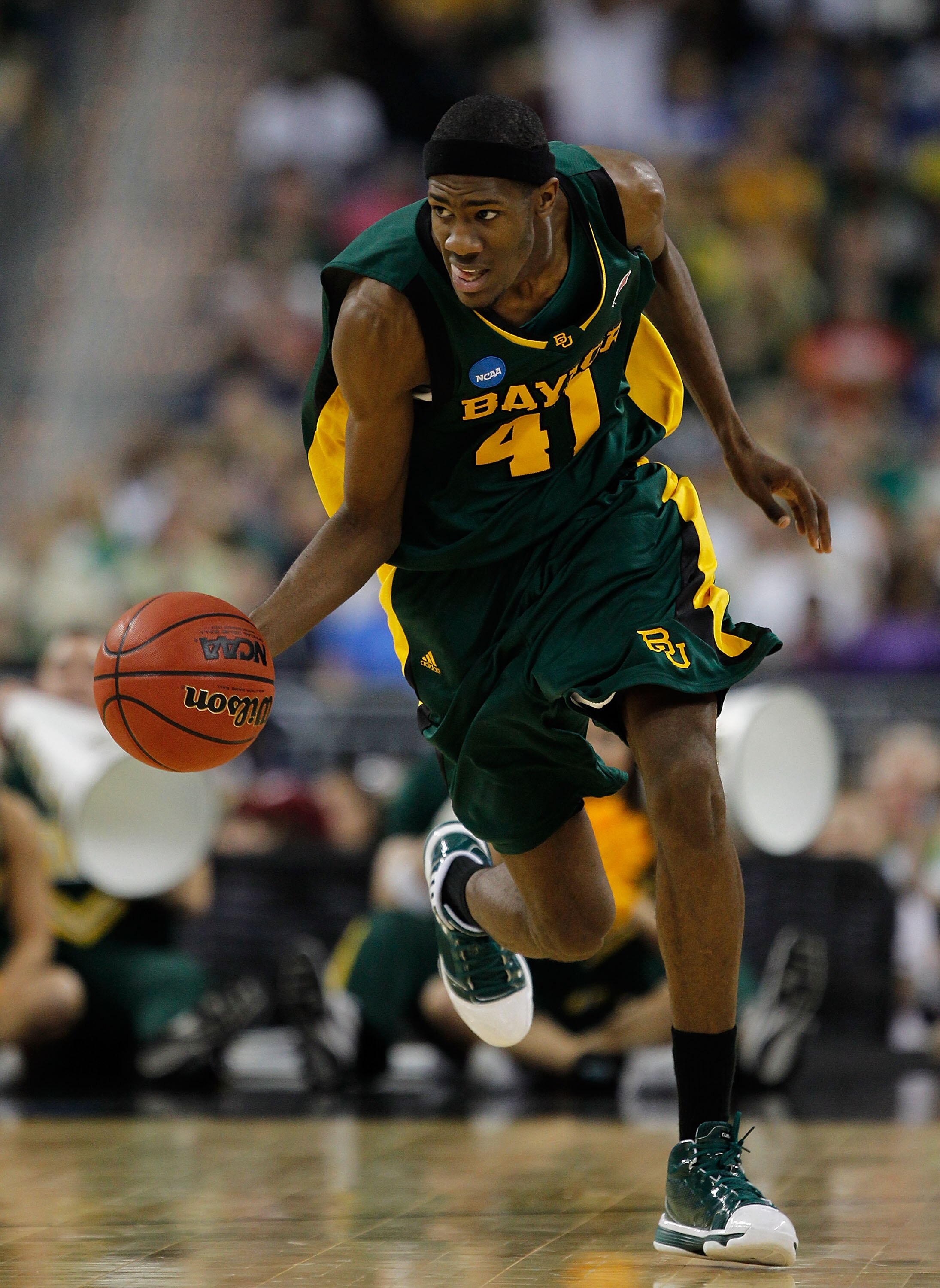 HOUSTON - MARCH 28: Anthony Jones #41 of the Baylor Bears breaks up the court after a steal against the Duke Blue Devils during the south regional final of the 2010 NCAA men's basketball tournament at Reliant Stadium on March 28, 2010 in Houston, Texas. (