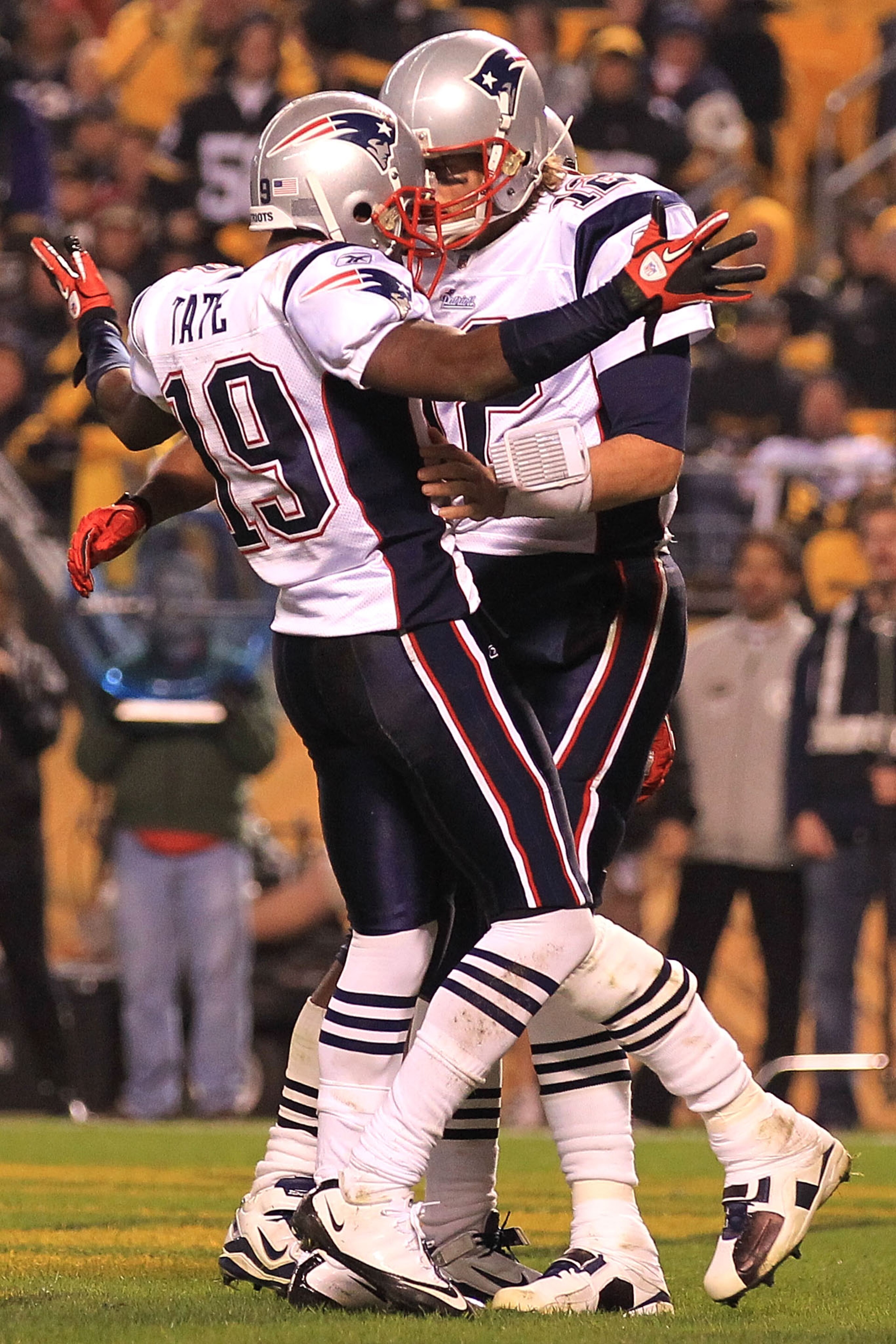 PITTSBURGH - NOVEMBER 14: Tom Brady #12 of the New England Patriots celebrates his touchdown with team mate Brandon Tate #19 against the Pittsburgh Steelers on November 14, 2010 at Heinz Field in Pittsburgh, Pennsylvania. (Photo by Chris McGrath/Getty I PITTSBURGH - NOVEMBER 14: Tom Brady #12 of the New England Patriots celebrates his touchdown with team mate Brandon Tate #19 against the Pittsburgh Steelers on November 14, 2010 at Heinz Field in Pittsburgh, Pennsylvania. (Photo by Chris McGrath/Getty I