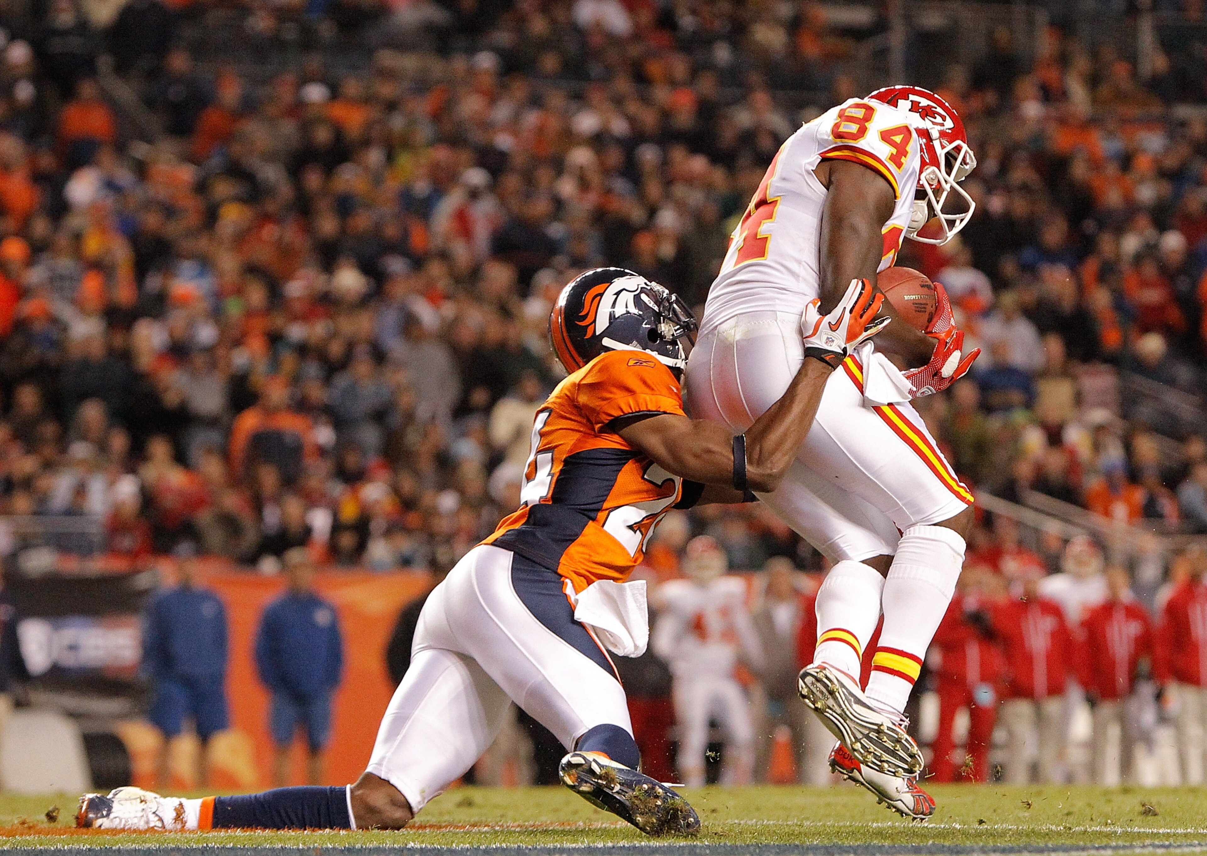 DENVER - NOVEMBER 14: Wide receiver Chris Chambers #84 of the Kansas City Chiefs makes a reception for a touchdown in front of cornerback Champ Bailey #24 of the Denver Broncos during the fourth quarter at INVESCO Field at Mile High on November 14, 2010 DENVER - NOVEMBER 14: Wide receiver Chris Chambers #84 of the Kansas City Chiefs makes a reception for a touchdown in front of cornerback Champ Bailey #24 of the Denver Broncos during the fourth quarter at INVESCO Field at Mile High on November 14, 2010