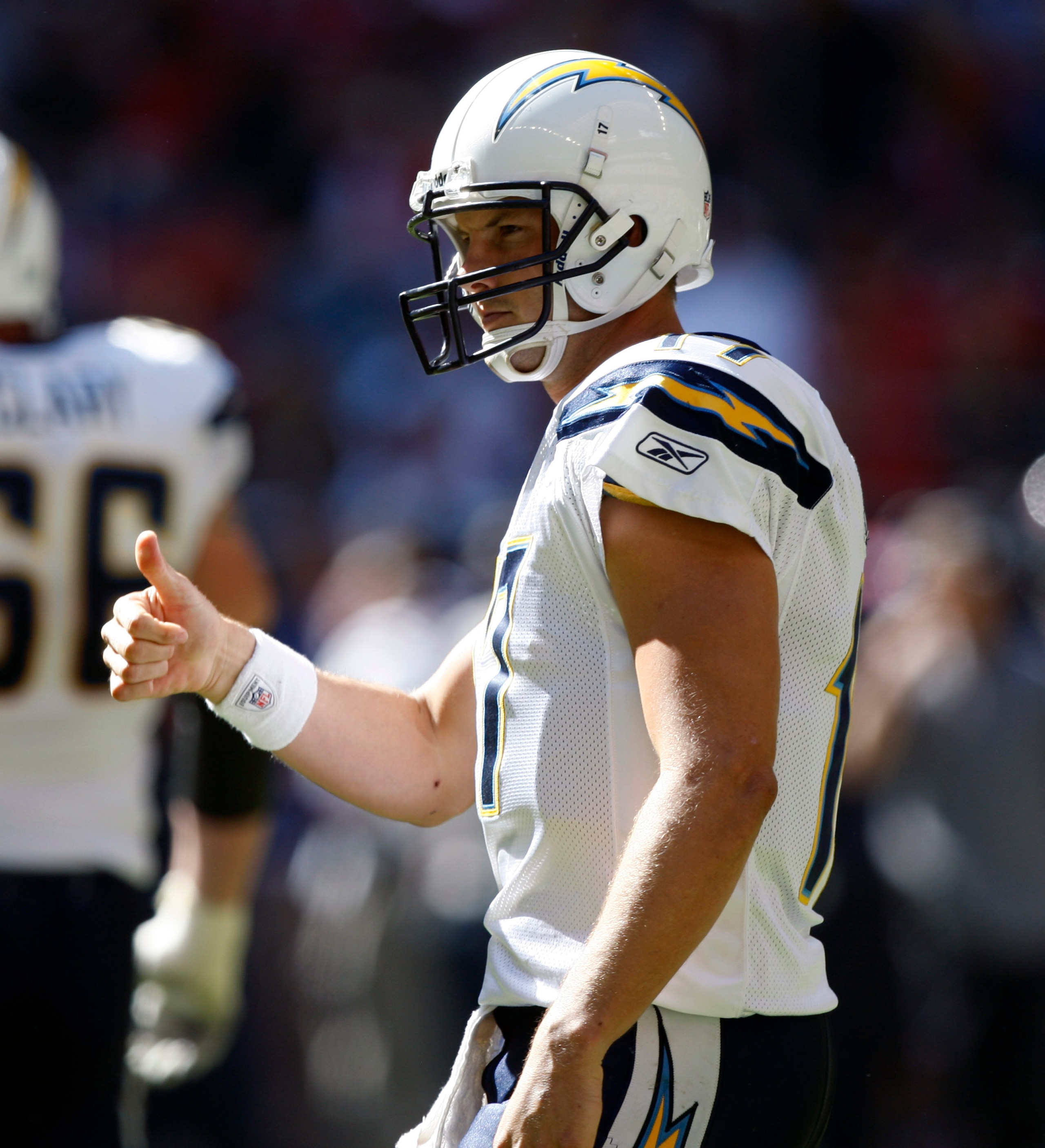 HOUSTON - NOVEMBER 07: Quarterback Philips #17 of the San Diego Chargers gives a thumbs up to he bench after a touchdown against the Houston Texans at Reliant Stadium on November 7, 2010 in Houston, Texas. (Photo by Bob Levey/Getty Images) HOUSTON - NOVEMBER 07: Quarterback Philips #17 of the San Diego Chargers gives a thumbs up to he bench after a touchdown against the Houston Texans at Reliant Stadium on November 7, 2010 in Houston, Texas. (Photo by Bob Levey/Getty Images)