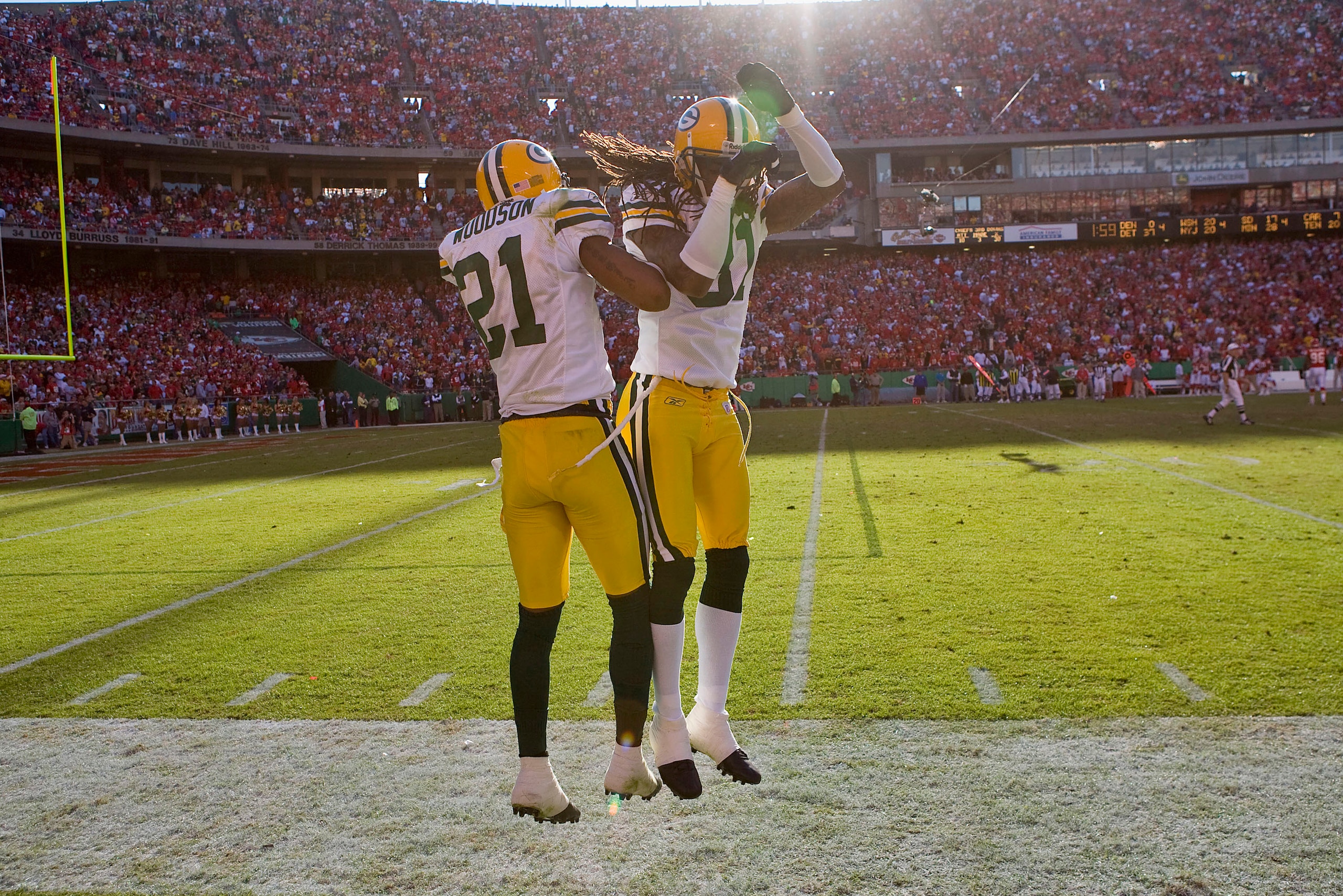 KANSAS CITY, MO - NOVEMBER 4: Charles Woodson #21 and Al Harris #31 both of the Green Bay Packers celebrate Woodson's touchdown return of an interception against the Kansas City Chiefs at Arrowhead Stadium November 4, 2007 in Kansas City, Missouri.  The P
