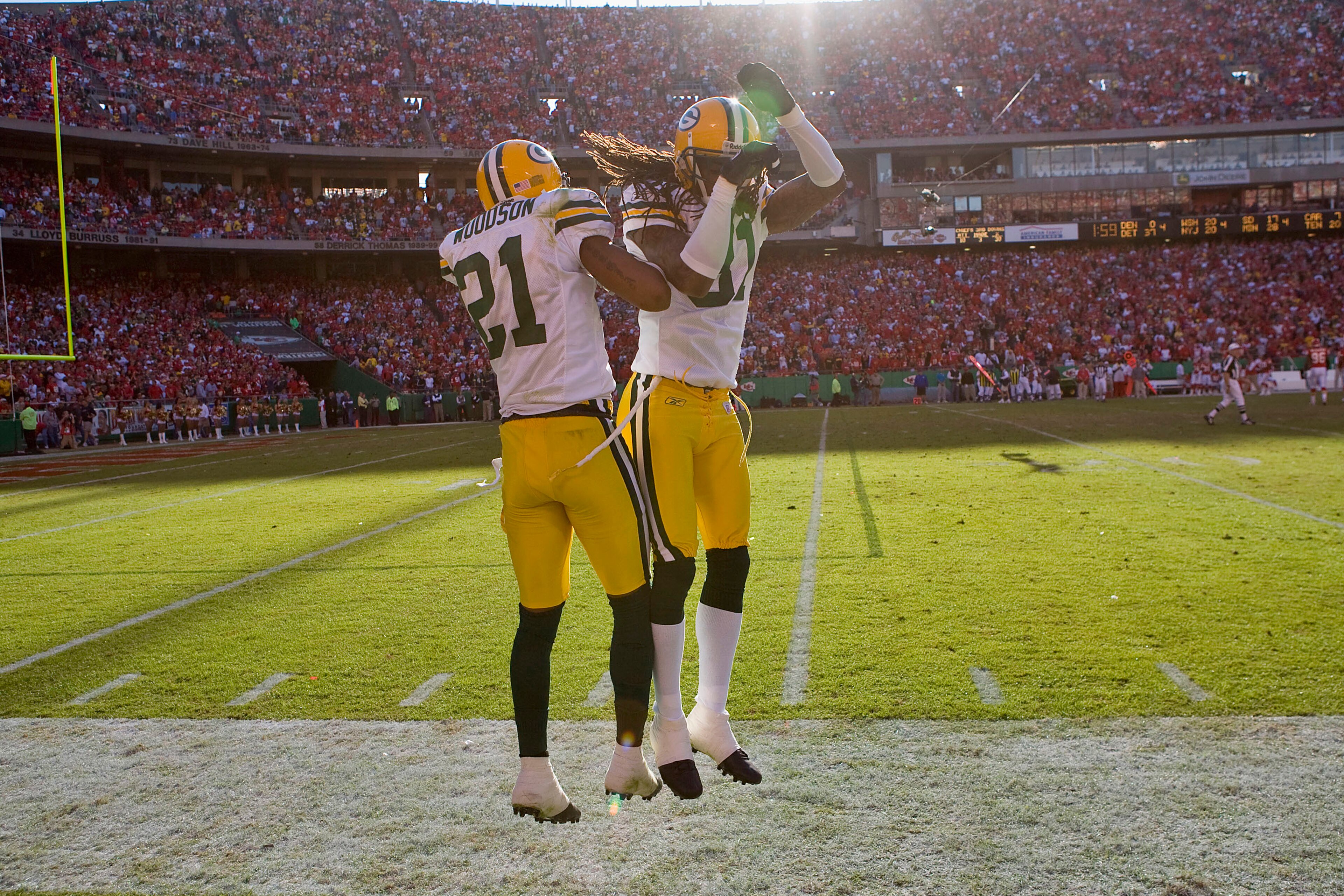 KANSAS CITY, MO - NOVEMBER 4: Charles Woodson #21 and Al Harris #31 both of the Green Bay Packers celebrate Woodson's touchdown return of an interception against the Kansas City Chiefs at Arrowhead Stadium November 4, 2007 in Kansas City, Missouri. The P KANSAS CITY, MO - NOVEMBER 4: Charles Woodson #21 and Al Harris #31 both of the Green Bay Packers celebrate Woodson's touchdown return of an interception against the Kansas City Chiefs at Arrowhead Stadium November 4, 2007 in Kansas City, Missouri. The P