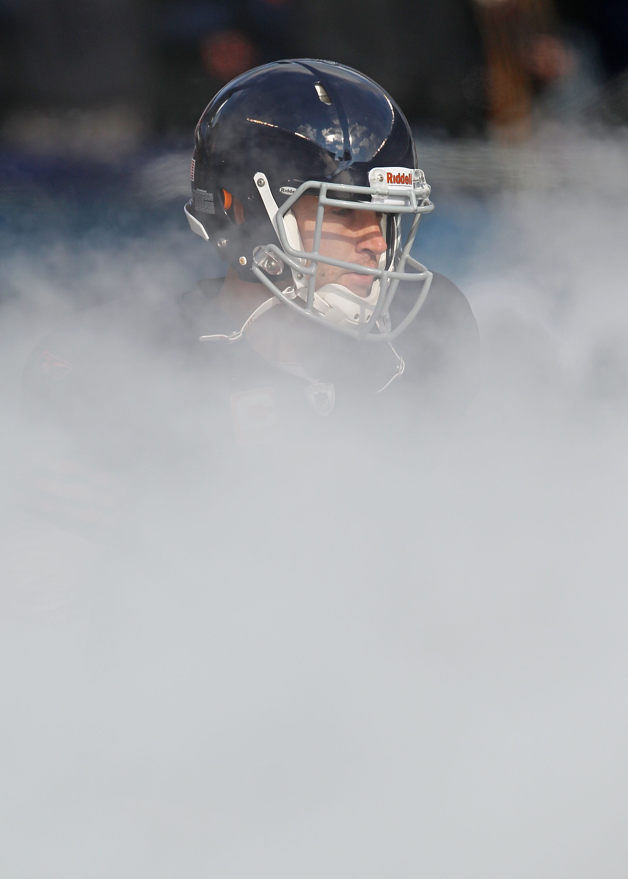 CHICAGO - NOVEMBER 14: Jay Cutler #6 of the Chicago Bears runs through smoke during player introductions before a game against the Minnesota Vikings at Soldier Field on November 14, 2010 in Chicago, Illinois. The Bears defeated the Vikings 27-13. (Photo b