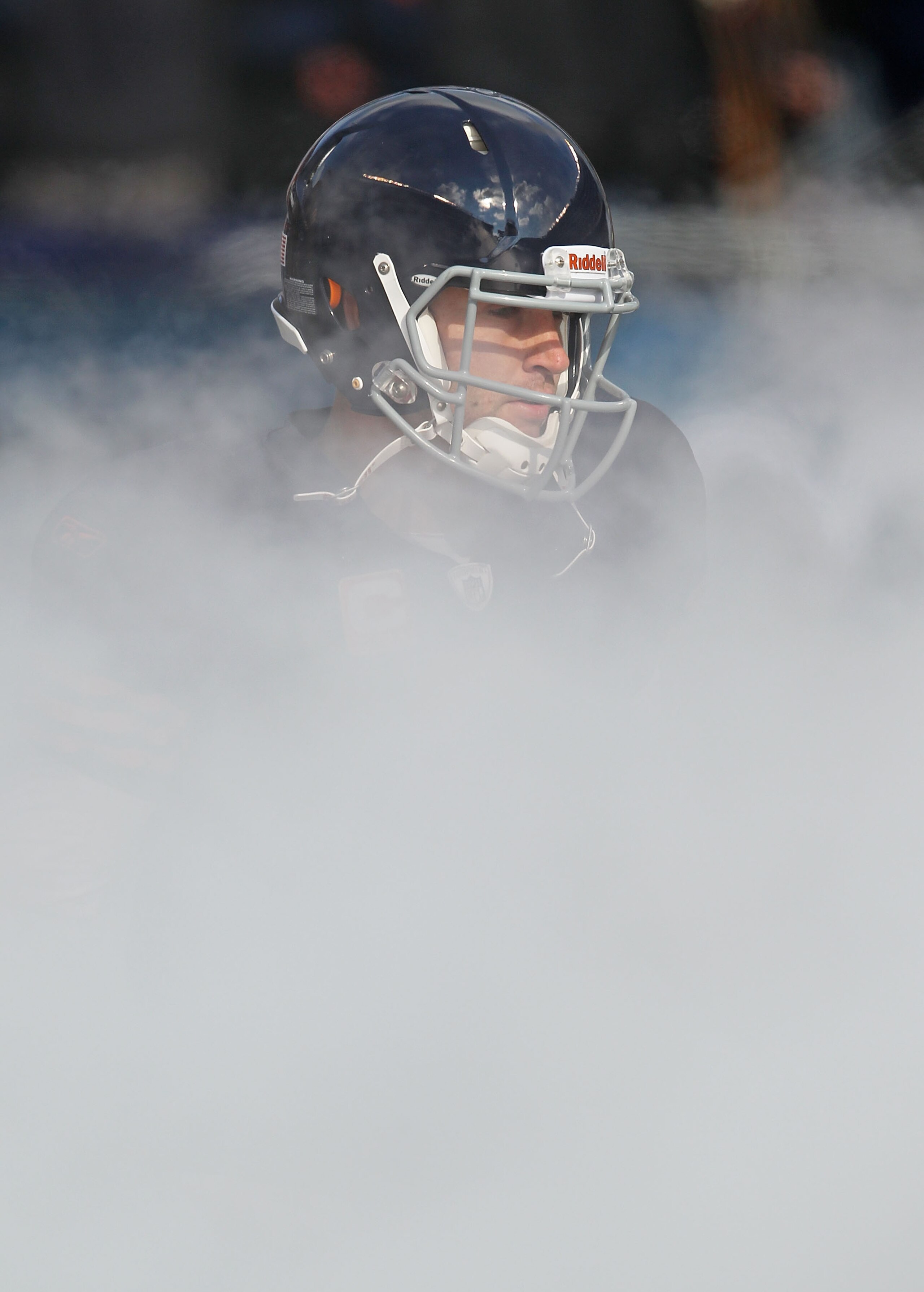 CHICAGO - NOVEMBER 14: Jay Cutler #6 of the Chicago Bears runs through smoke during player introductions before a game against the Minnesota Vikings at Soldier Field on November 14, 2010 in Chicago, Illinois. The Bears defeated the Vikings 27-13. (Photo b