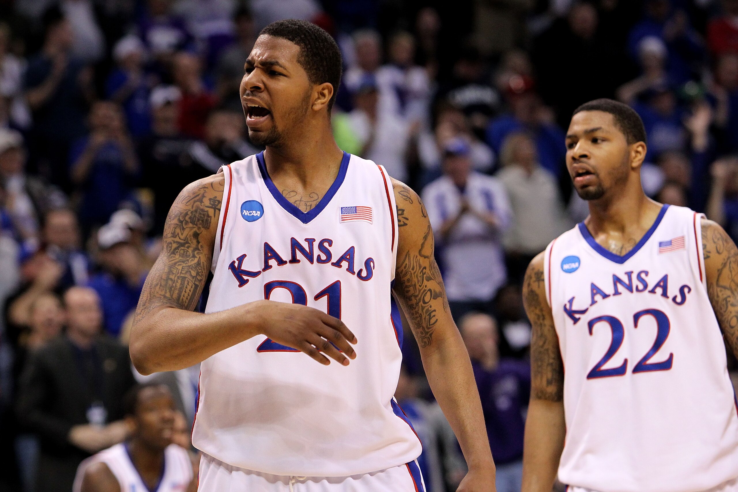 OKLAHOMA CITY - MARCH 20: (L-R) Markieff Morris #21 and Marcus Morris #22 of the Kansas Jayhawks react against the Northern Iowa Panthers during the second round of the 2010 NCAA men's basketball tournament at Ford Center on March 20, 2010 in Oklahoma Ci OKLAHOMA CITY - MARCH 20: (L-R) Markieff Morris #21 and Marcus Morris #22 of the Kansas Jayhawks react against the Northern Iowa Panthers during the second round of the 2010 NCAA men's basketball tournament at Ford Center on March 20, 2010 in Oklahoma Ci