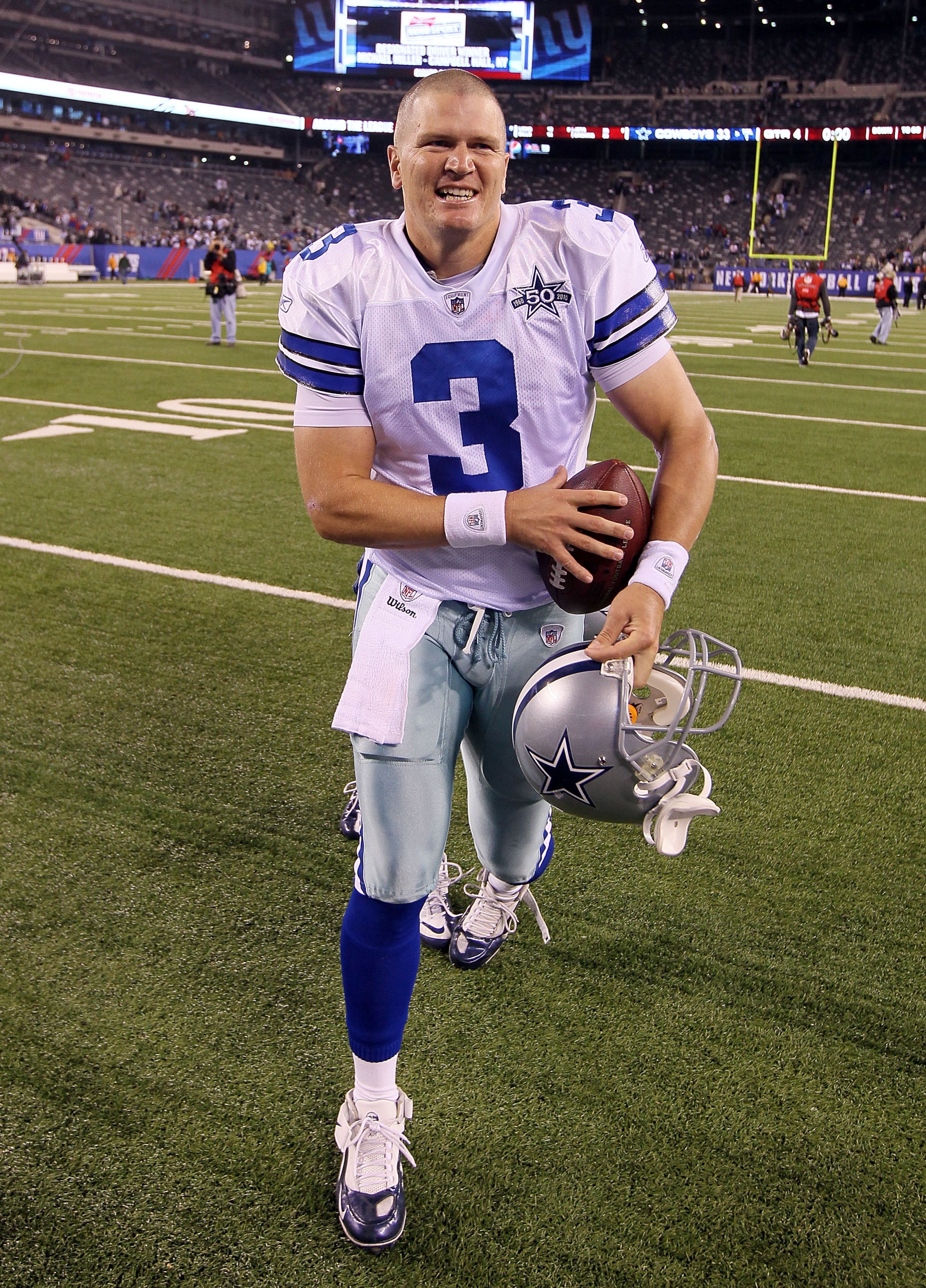 EAST RUTHERFORD, NJ - NOVEMBER 14:  Jon Kitna #3 of the Dallas Cowboys celebrates as he runs off the field after defeating the New York Giants on November 14, 2010 at the New Meadowlands Stadium in East Rutherford, New Jersey. The Cowboys defeated the Gia