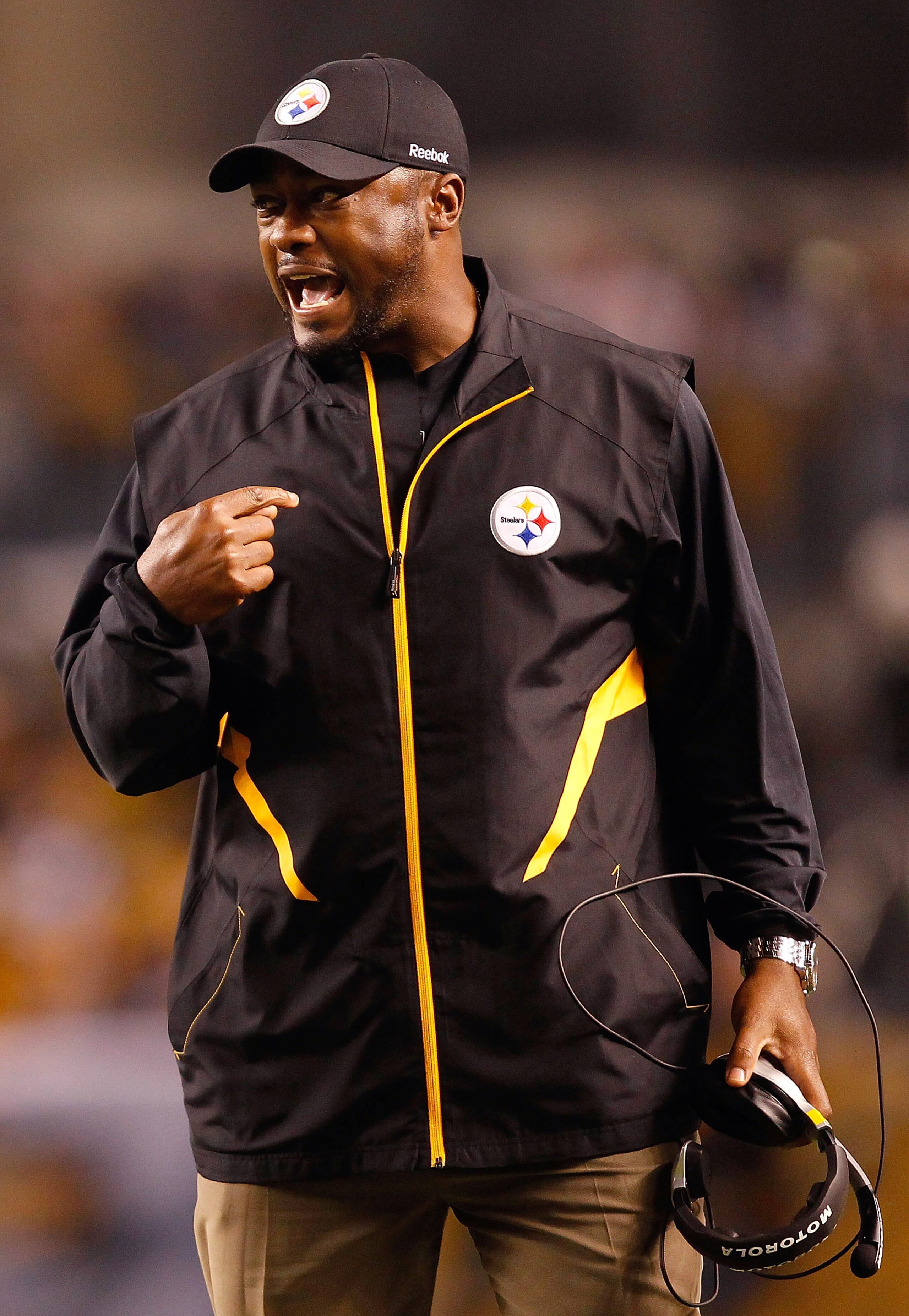 PITTSBURGH - NOVEMBER 14:  Head coach Mike Tomlin of the Pittsburgh Steelers talks to the referees during the game against the New England Patriots on November 14, 2010 at Heinz Field in Pittsburgh, Pennsylvania.  (Photo by Jared Wickerham/Getty Images)