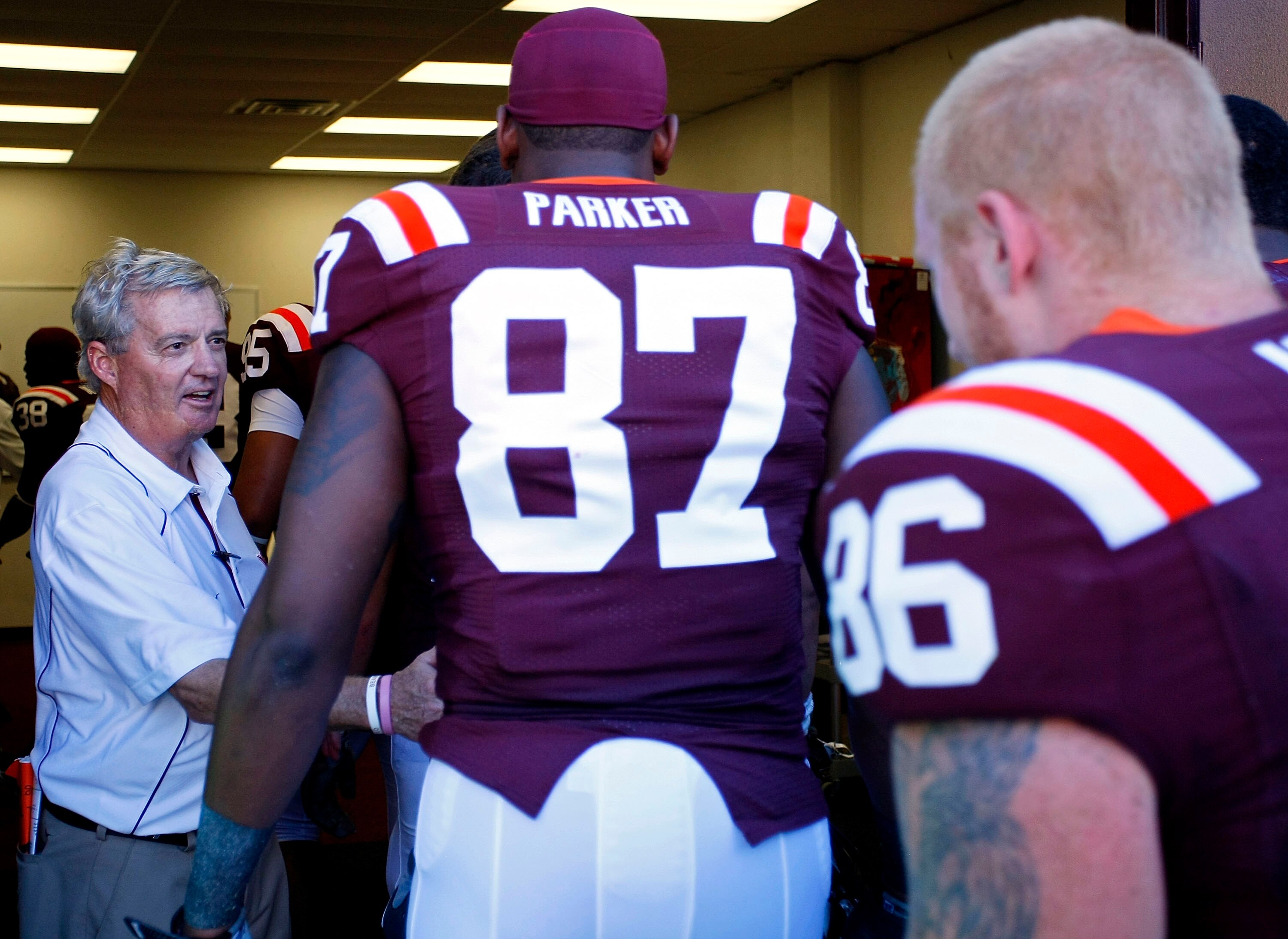 BLACKSBURG, VA - SEPTEMBER 18:  Virginia Tech Hokies head coach Frank Beamer congratulates his players as they enter the locker room after defeating the East Carolina Pirates 49-27 at Lane Stadium on September 18, 2010 in Blacksburg, Virginia.  (Photo by