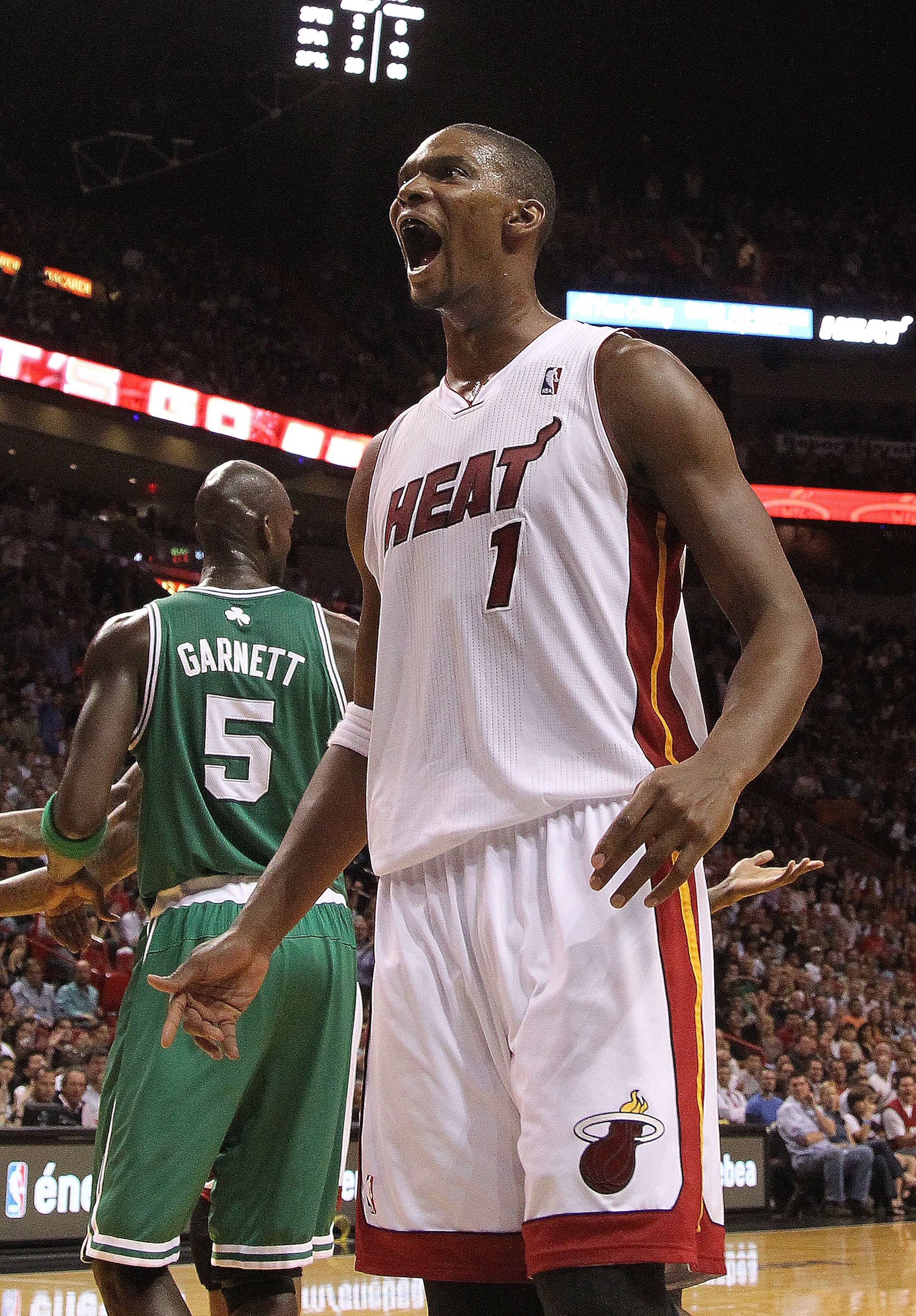 MIAMI - NOVEMBER 11:   Chris Bosh #1 of the Miami Heat reacts after getting fouled during a game against the Boston Celtics at American Airlines Arena on November 11, 2010 in Miami, Florida. NOTE TO USER: User expressly acknowledges and agrees that, by do