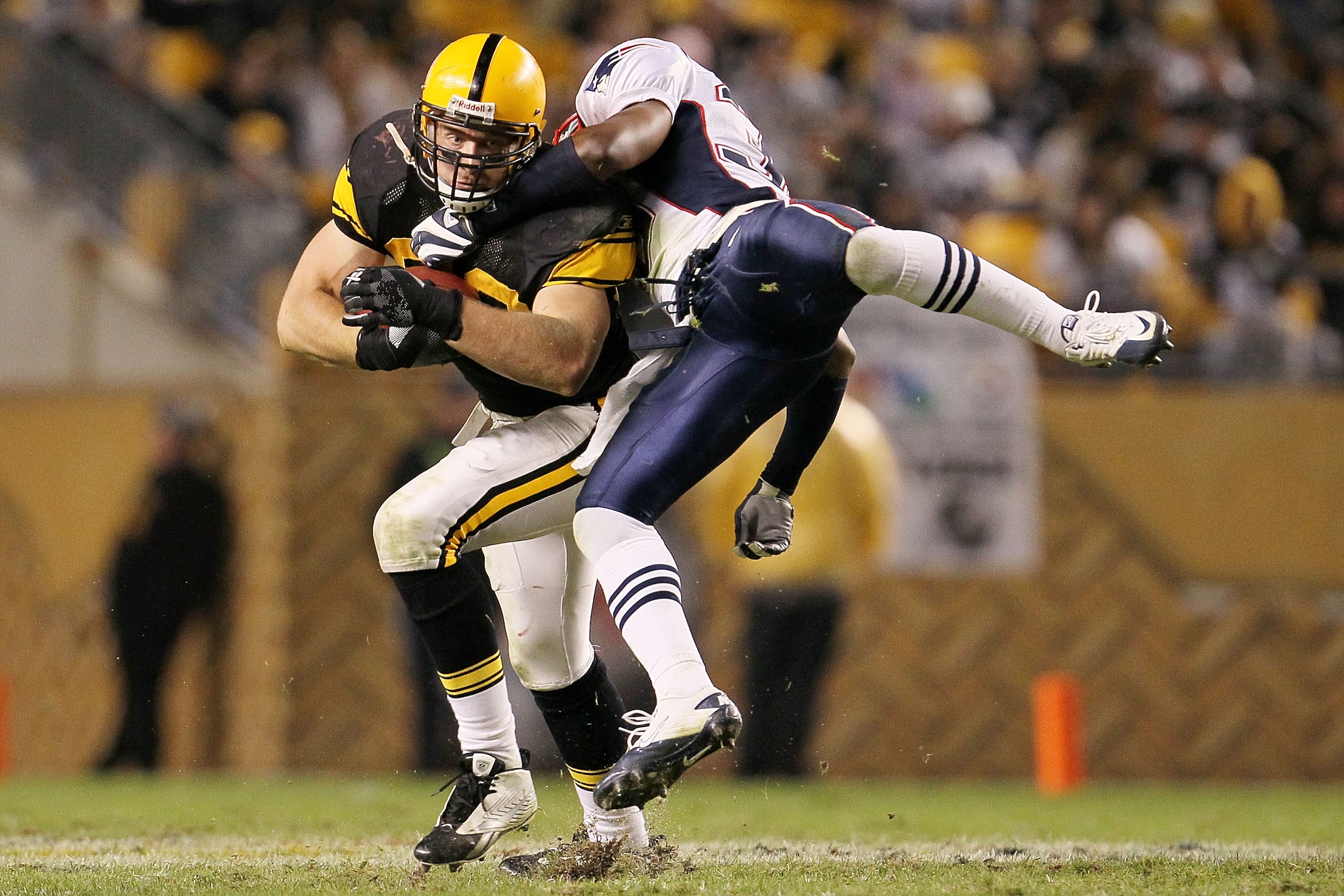 PITTSBURGH - NOVEMBER 14:  Heath Miller #83  of the Pittsburgh Steelers is tackled by James Sanders #36 of the New England Patriots on November 14, 2010 at Heinz Field in Pittsburgh, Pennsylvania.  (Photo by Chris McGrath/Getty Images)