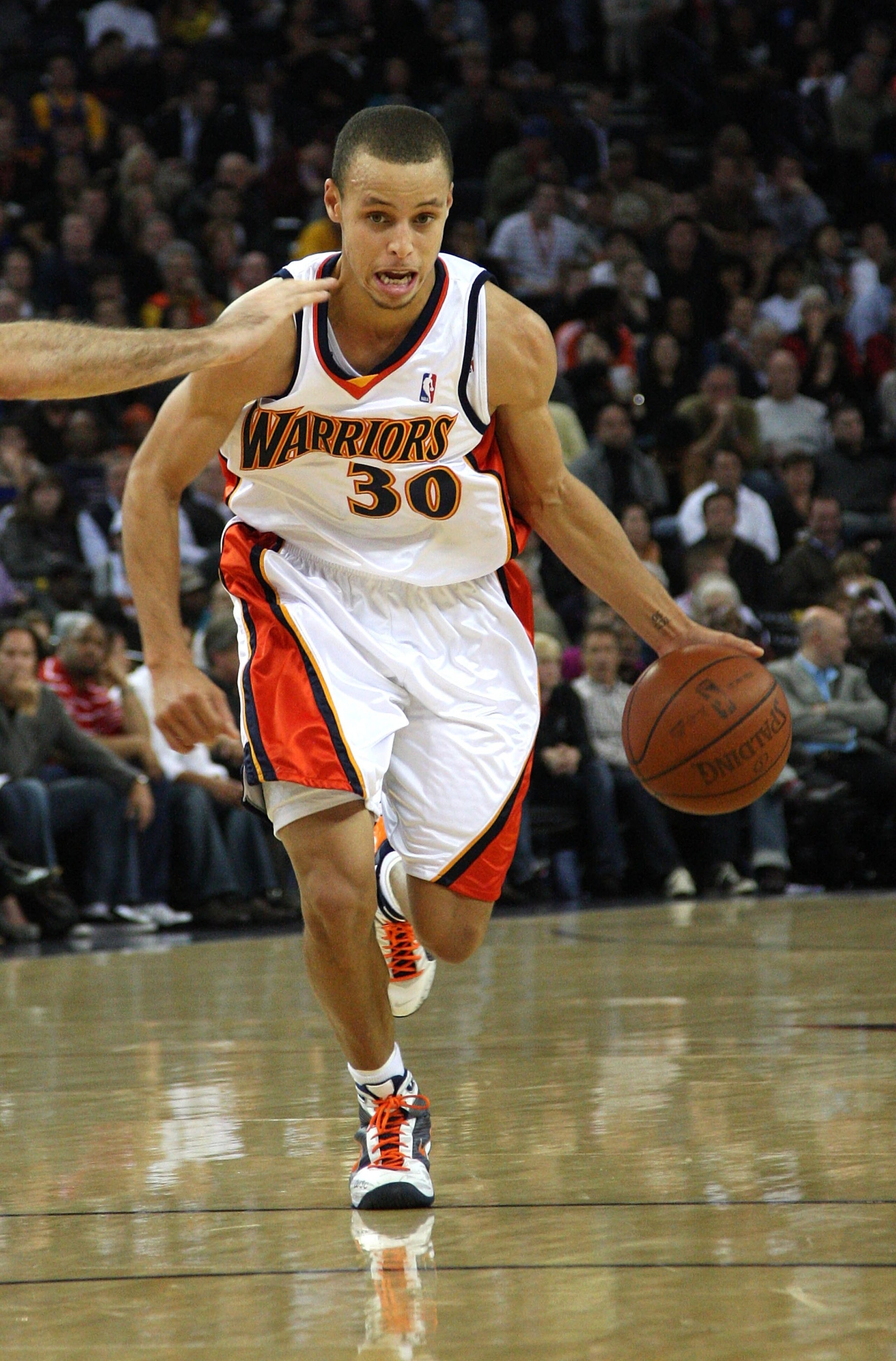 OAKLAND, CA - NOVEMBER 20:  Stephen Curry #30 of the Golden State Warriors looks on against the Portland Trail Blazers durin an NBA game at Oracle Arena on November 20, 2009 in Oakland, California.  (Photo by Jed Jacobsohn/Getty Images)