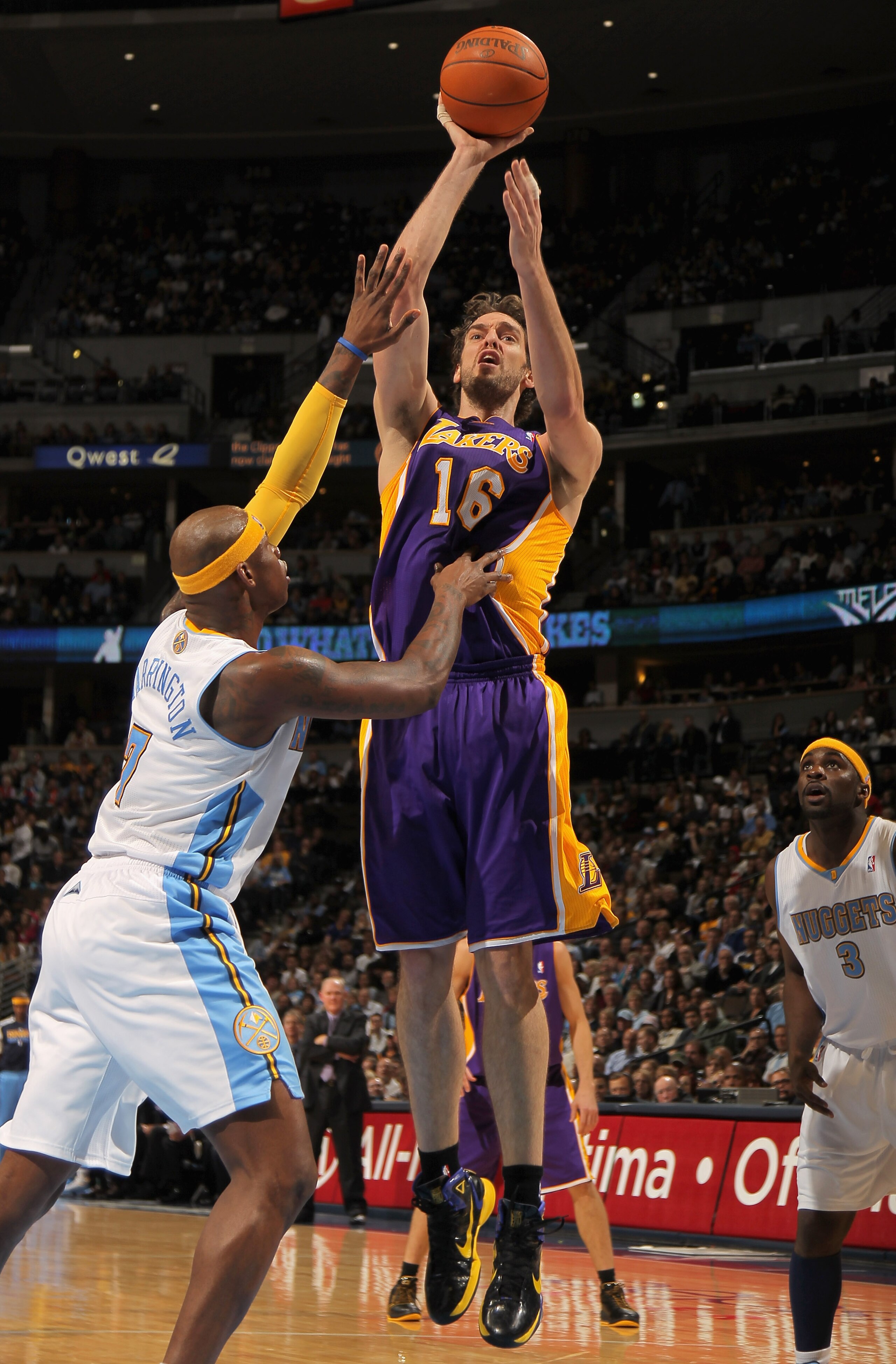 DENVER - NOVEMBER 11:  Pau Gasol #16 of the Los Angeles Lakers takes a shot over Al Harrington #7 of the Denver Nuggets at the Pepsi Center on November 11, 2010 in Denver, Colorado. The Nuggets defeated the Lakers 118-112.  NOTE TO USER: User expressly ac