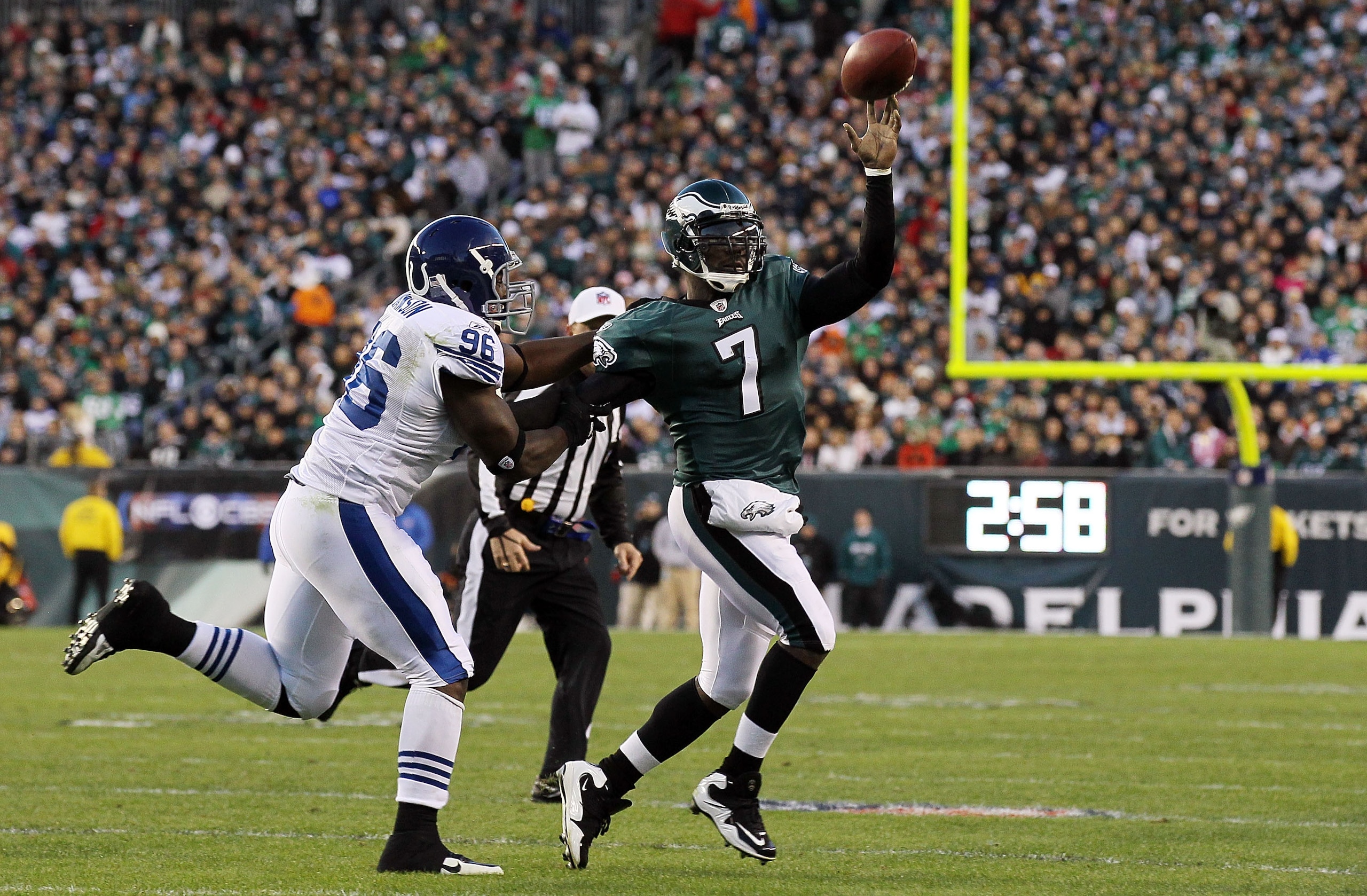 PHILADELPHIA - NOVEMBER 07: Michael Vick #7 of the Philadelphia Eagles throws a pass under pressure from Keyunta Dawson #96 of the Indianapolis Colts on November 7, 2010 at Lincoln Financial Field in Philadelphia, Pennsylvania. (Photo by Jim McIsaac/Get PHILADELPHIA - NOVEMBER 07: Michael Vick #7 of the Philadelphia Eagles throws a pass under pressure from Keyunta Dawson #96 of the Indianapolis Colts on November 7, 2010 at Lincoln Financial Field in Philadelphia, Pennsylvania. (Photo by Jim McIsaac/Get