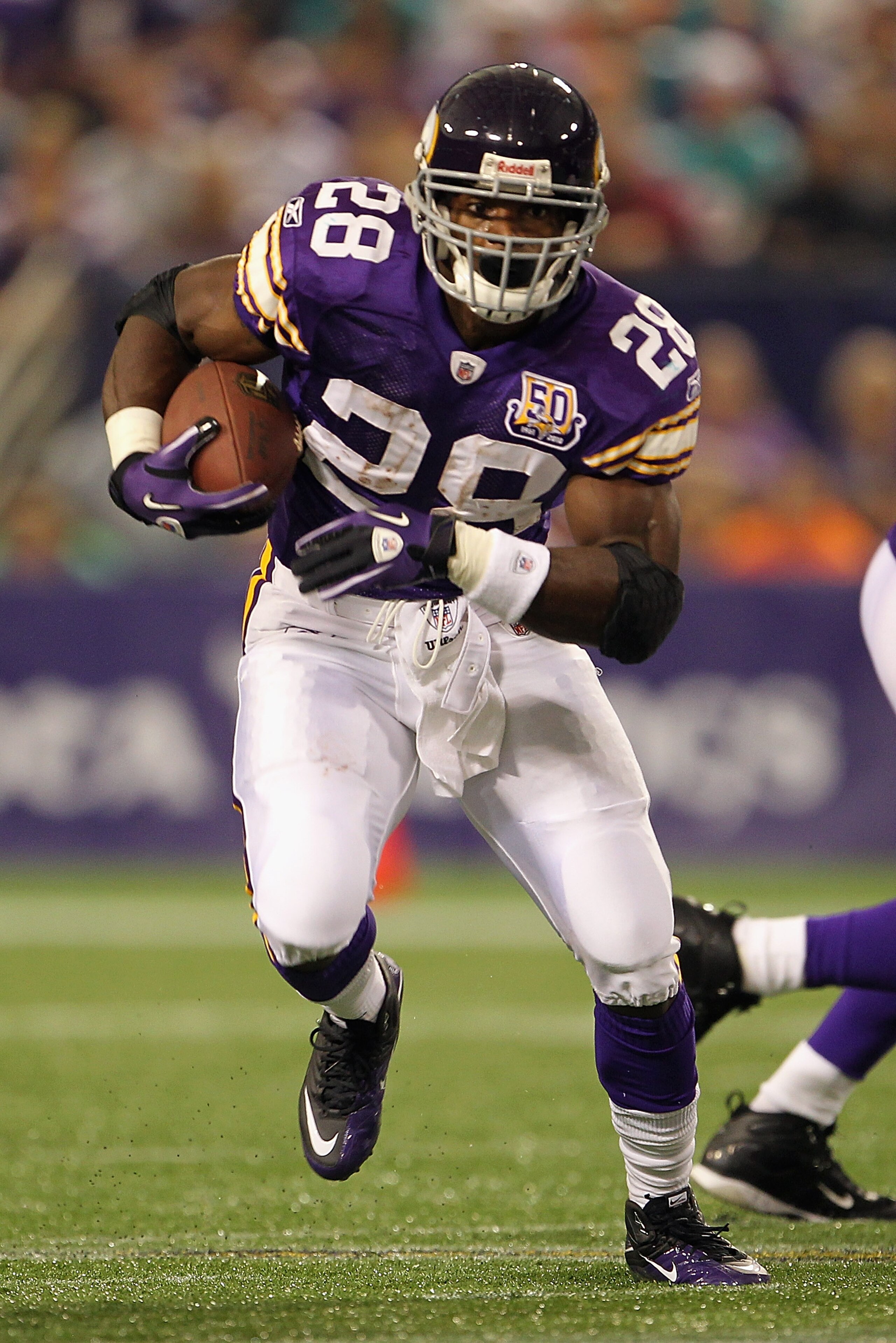 MINNEAPOLIS - SEPTEMBER 19:  Running back Adrian Peterson #28 of the Minnesota Vikings in action during the game against  of the Miami Dolphins on September 19, 2010 at Hubert H. Humphrey Metrodome in Minneapolis, Minnesota.  (Photo by Jamie Squire/Getty