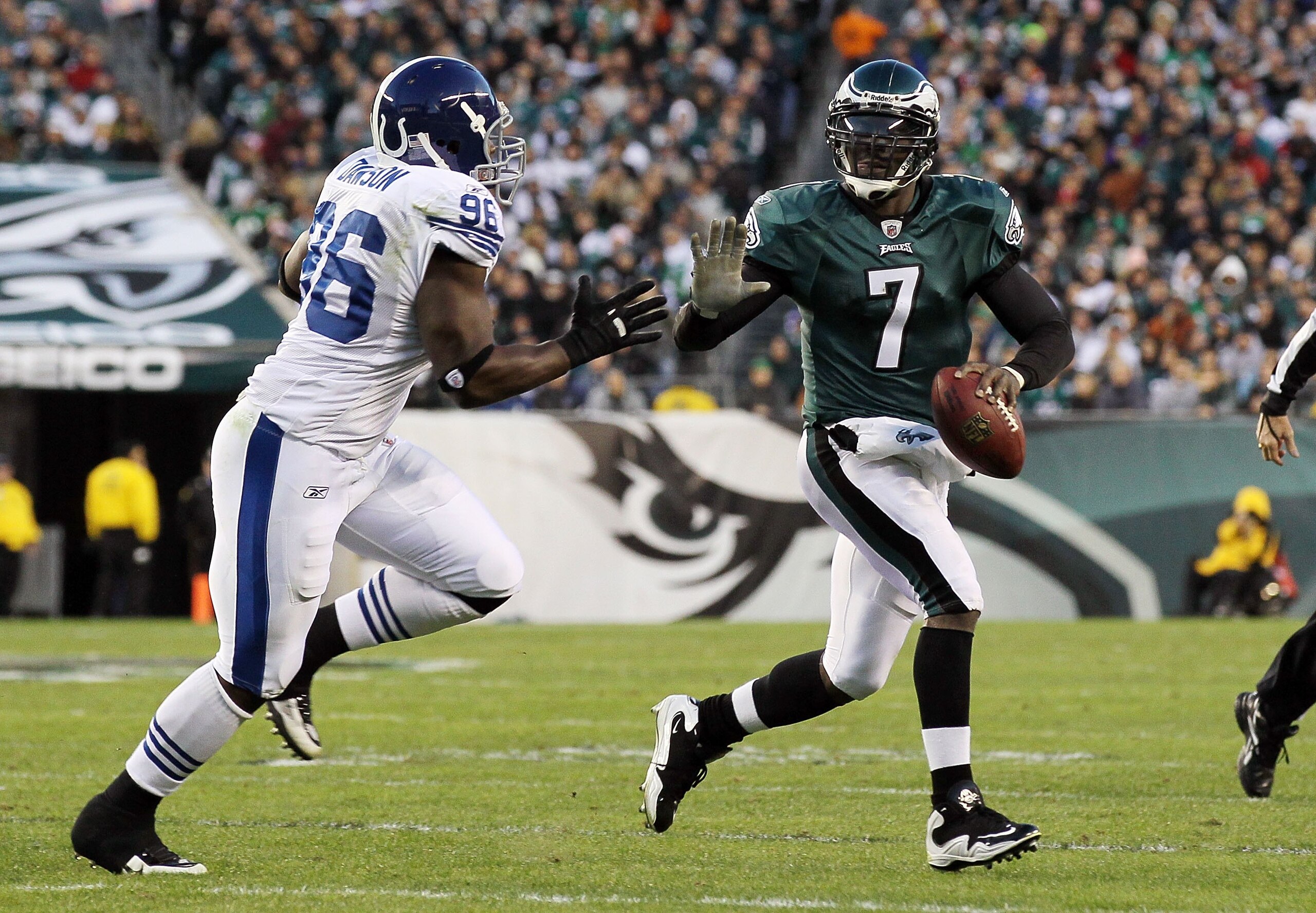 PHILADELPHIA - NOVEMBER 07:  Michael Vick #7 of the Philadelphia Eagles in against Keyunta Dawson #96 of the Indianapolis Colts on November 7, 2010 at Lincoln Financial Field in Philadelphia, Pennsylvania. The Eagles defeated the Colts 26-24.  (Photo by J