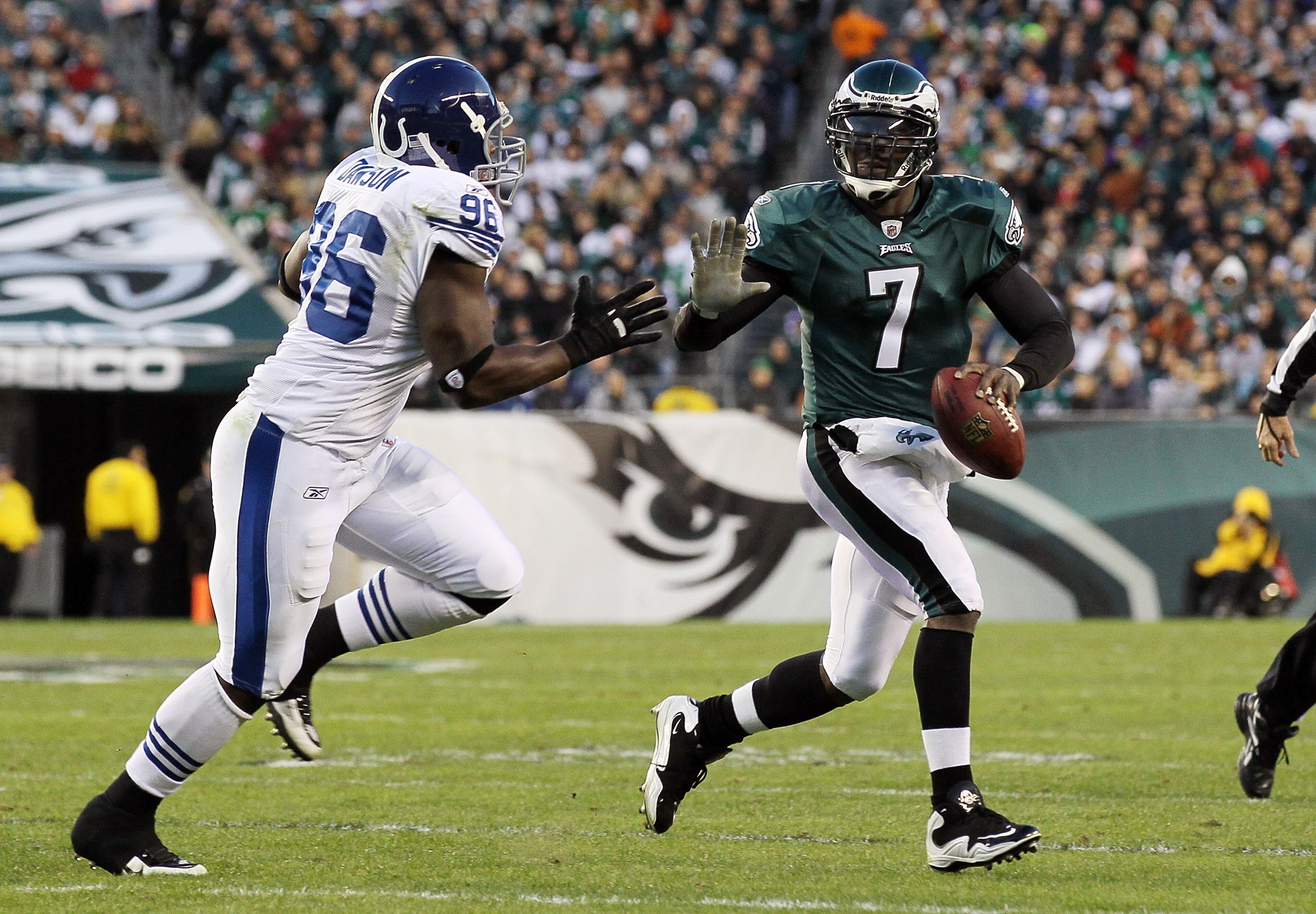 PHILADELPHIA - NOVEMBER 07:  Michael Vick #7 of the Philadelphia Eagles in against Keyunta Dawson #96 of the Indianapolis Colts on November 7, 2010 at Lincoln Financial Field in Philadelphia, Pennsylvania. The Eagles defeated the Colts 26-24.  (Photo by J