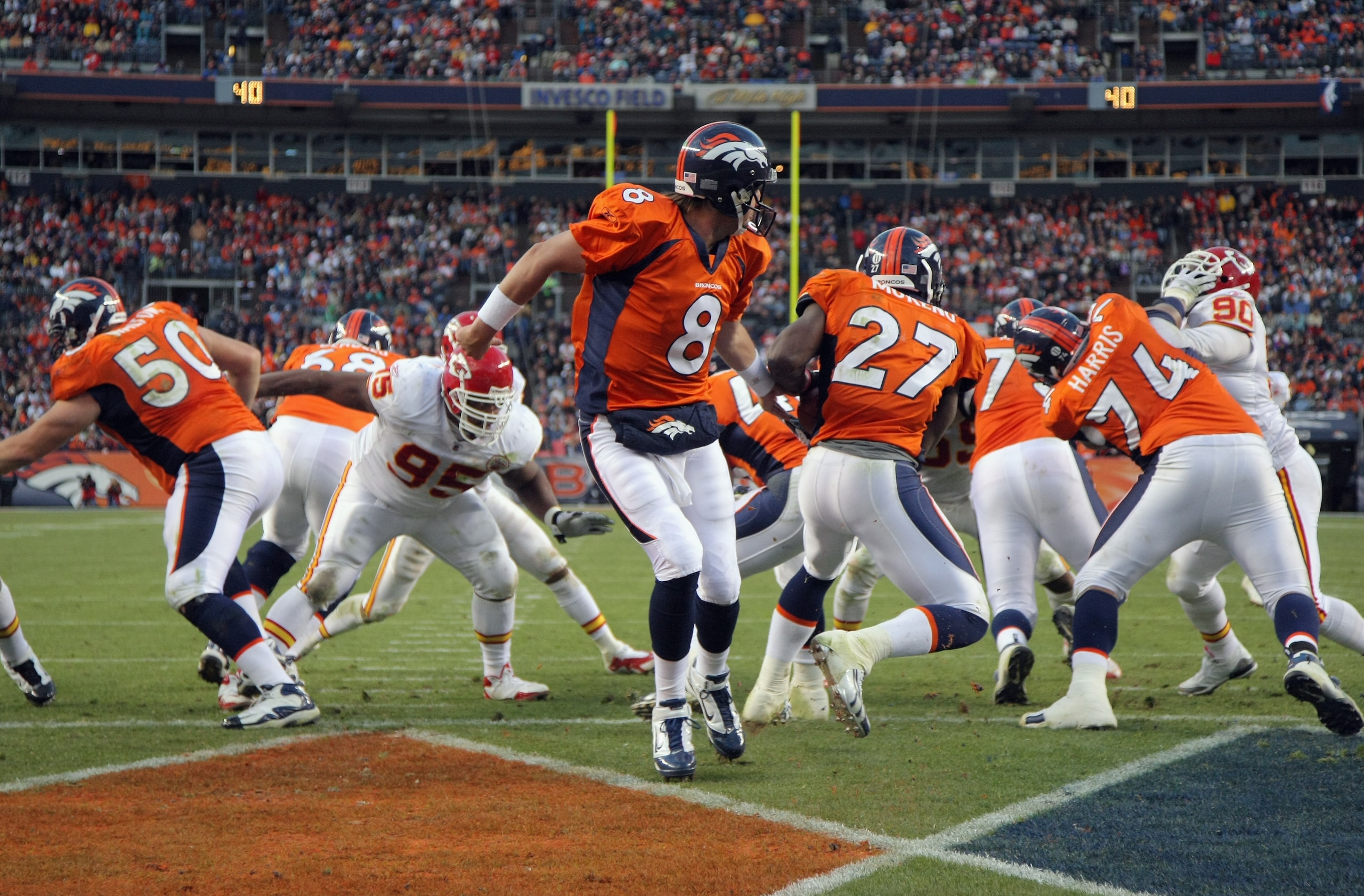 DENVER - NOVEMBER 14: Quarterback Kyle Orton #8 of the Denver Broncos hands off to running back Knowshon Moreno #27 from his own endzone against the Kansas City Chiefs at INVESCO Field at Mile High on November 14, 2010 in Denver, Colorado. The Broncos de DENVER - NOVEMBER 14: Quarterback Kyle Orton #8 of the Denver Broncos hands off to running back Knowshon Moreno #27 from his own endzone against the Kansas City Chiefs at INVESCO Field at Mile High on November 14, 2010 in Denver, Colorado. The Broncos de
