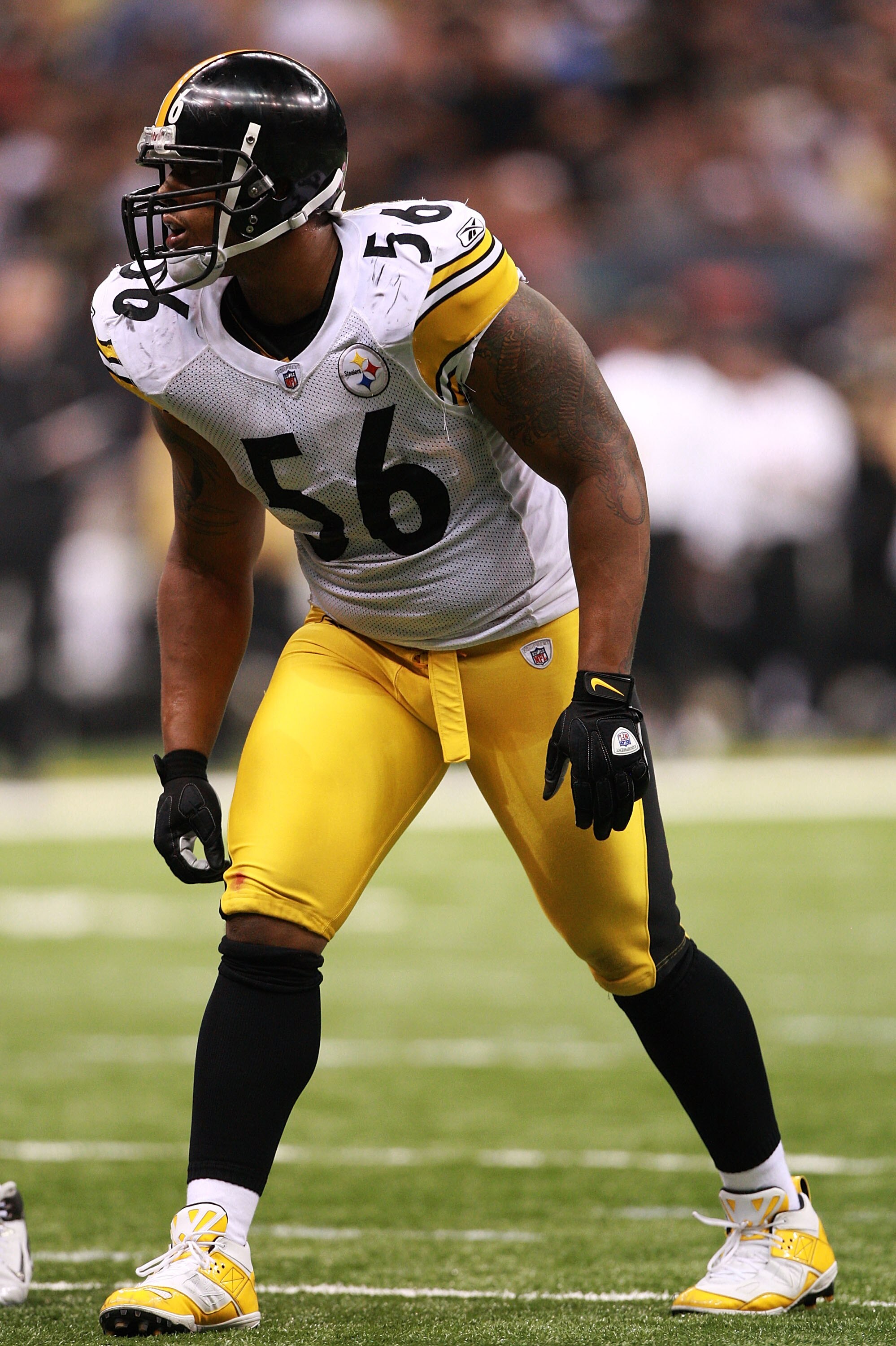 NEW ORLEANS - OCTOBER 31:  LaMarr Woodley #56 of the Pittsburgh Steelers hovers at the line of scrimmage during the game against the New Orleans Saints at Louisiana Superdome on October 31, 2010 in New Orleans, Louisiana.  The Saints won 20-10 over the St