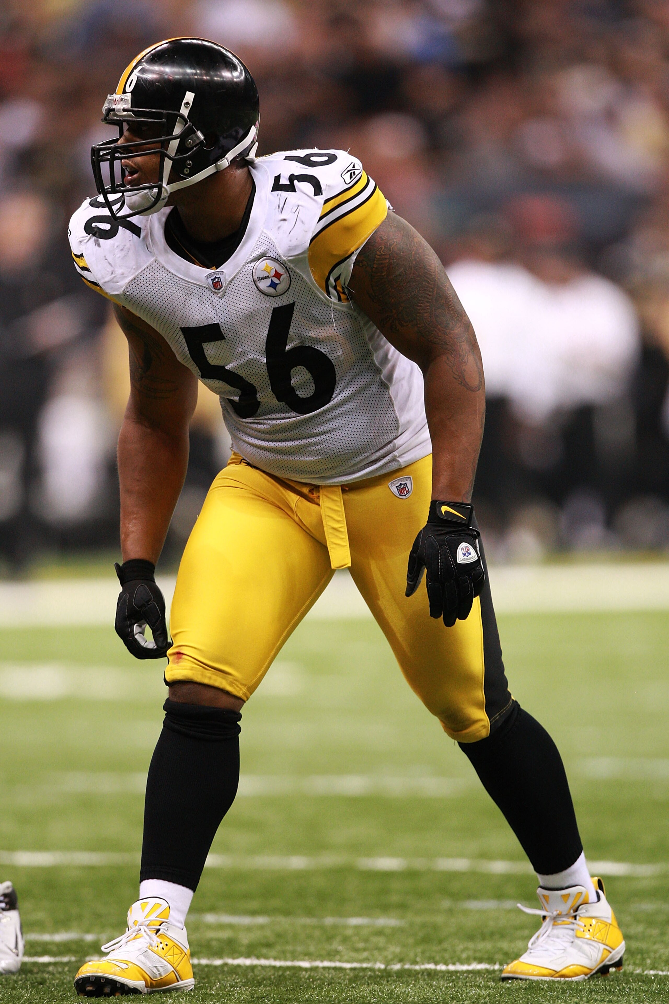 NEW ORLEANS - OCTOBER 31:  LaMarr Woodley #56 of the Pittsburgh Steelers hovers at the line of scrimmage during the game against the New Orleans Saints at Louisiana Superdome on October 31, 2010 in New Orleans, Louisiana.  The Saints won 20-10 over the St