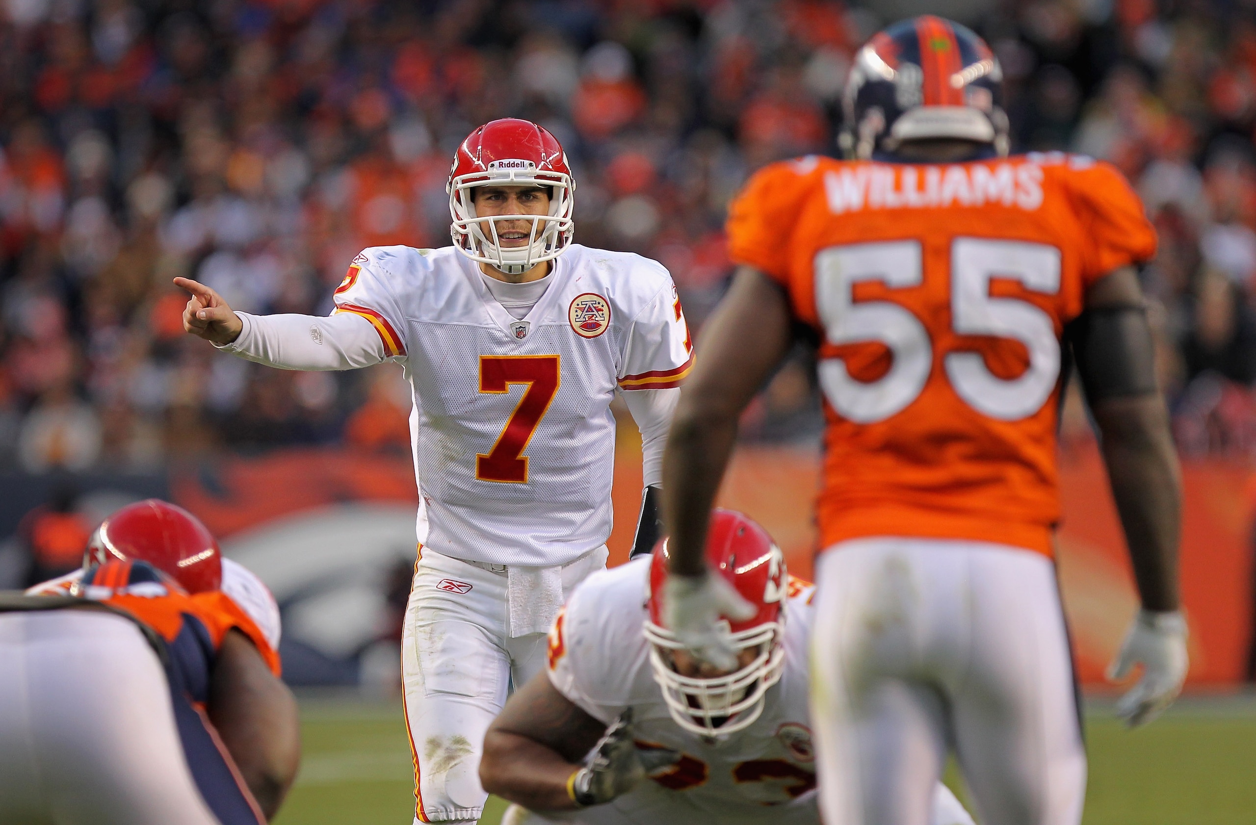 DENVER - NOVEMBER 14:  Quarterback Matt Cassel #7 of the Kansas City Chiefs runs the offense against D J Williams #55 and the Denver Bronco at INVESCO Field at Mile High on November 14, 2010 in Denver, Colorado. The Broncos defeated the Chiefs 49-29.  (Ph