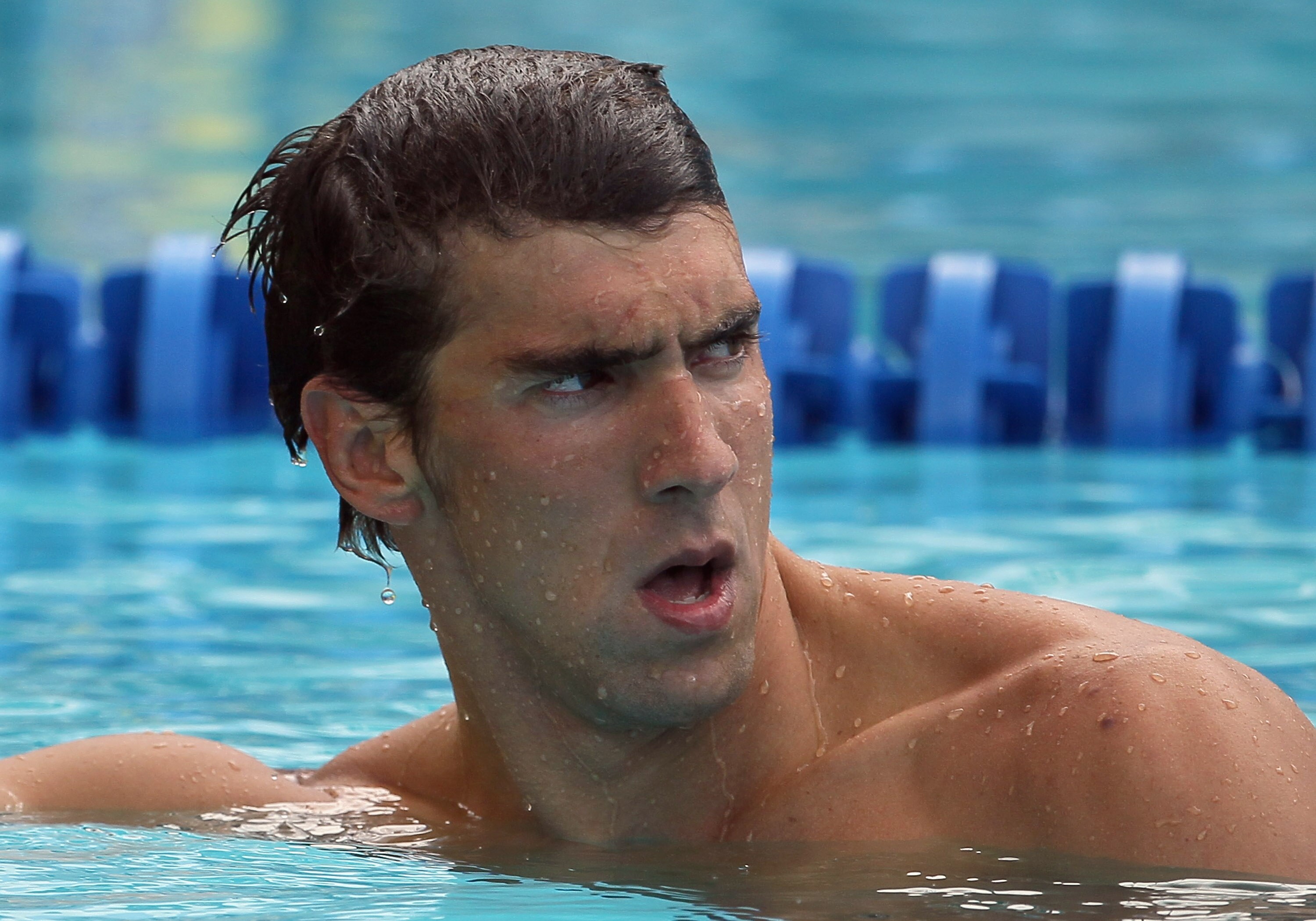 IRVINE, CA - AUGUST 18:  Michael Phelps swims in the men's 200 meter butterfly preliminary heat during the Mutual of Omaha Pan Pacific Championships at the William Woollett Jr. Aquatic Center on August 18, 2010 in Irvine, California.  (Photo by Jeff Gross