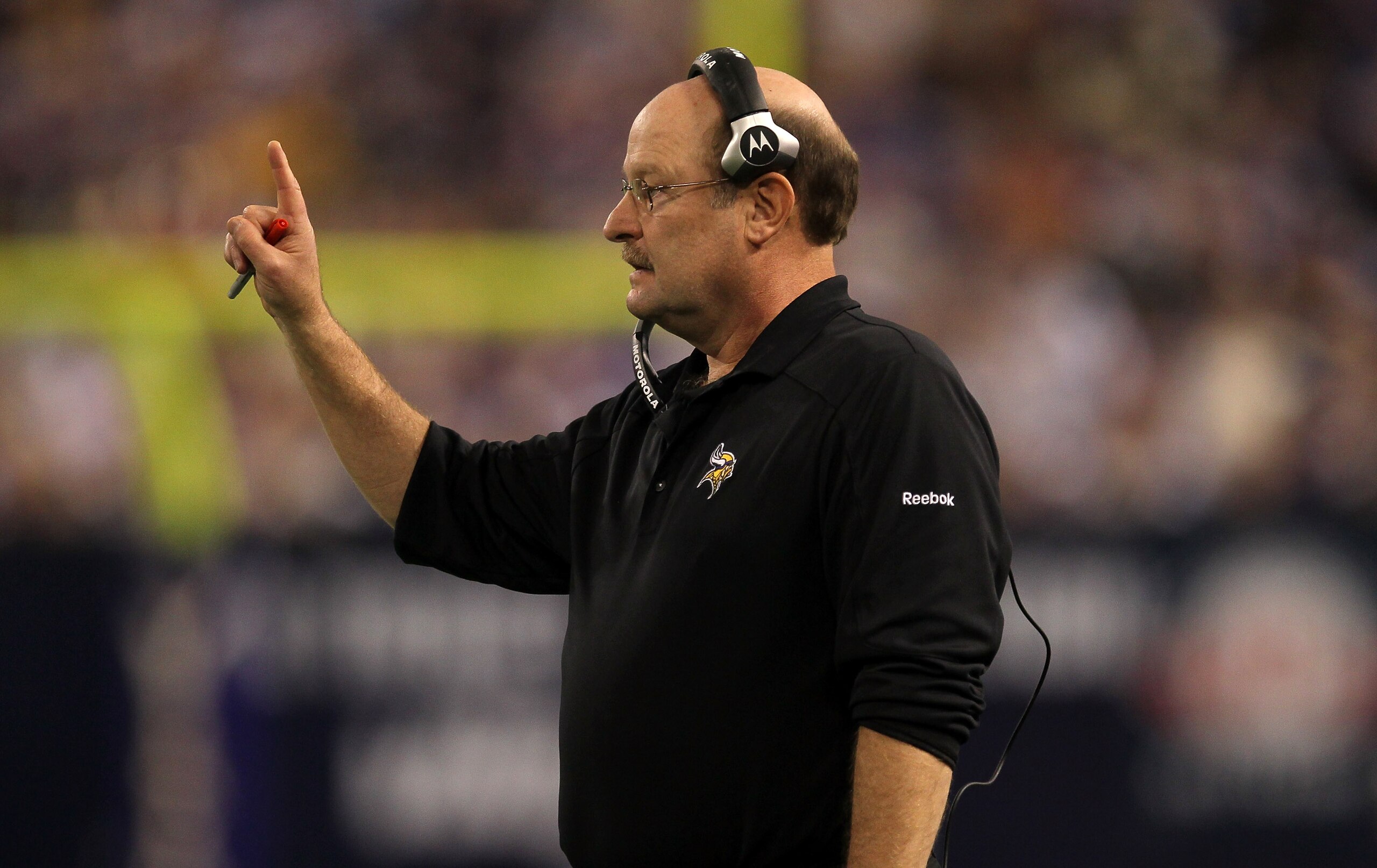 MINNEAPOLIS - NOVEMBER 7:  Head coach Brad Childress of the Minnesota Vikings signals during the game with the Arizona Cardinals at Hubert H. Humphrey Metrodome on November 7, 2010 in Minneapolis, Minnesota.  (Photo by Stephen Dunn/Getty Images)