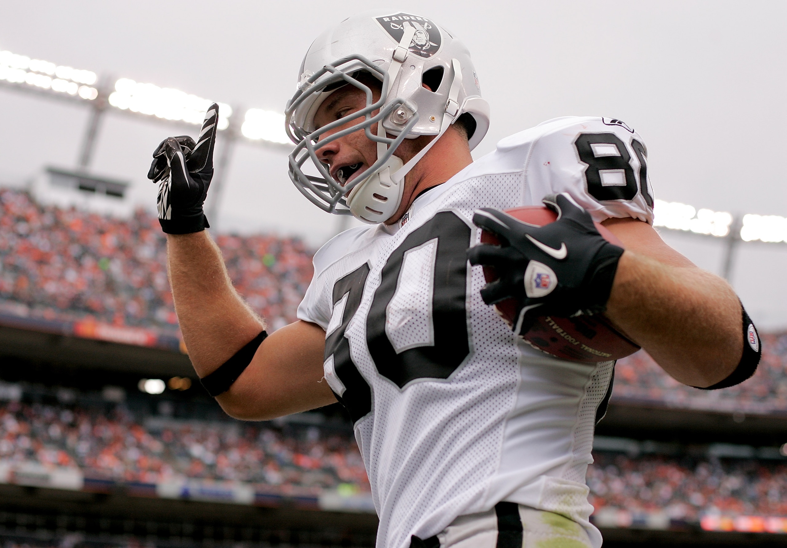 DENVER - OCTOBER 24: Tight end Zach Miller #80 of the Oakland Raiders celebrates a touchdown reception in the first quarter against the Denver Broncos at INVESCO Field at Mile High on October 24, 2010 in Denver, Colorado. (Photo by Justin Edmonds/Getty I DENVER - OCTOBER 24: Tight end Zach Miller #80 of the Oakland Raiders celebrates a touchdown reception in the first quarter against the Denver Broncos at INVESCO Field at Mile High on October 24, 2010 in Denver, Colorado. (Photo by Justin Edmonds/Getty I