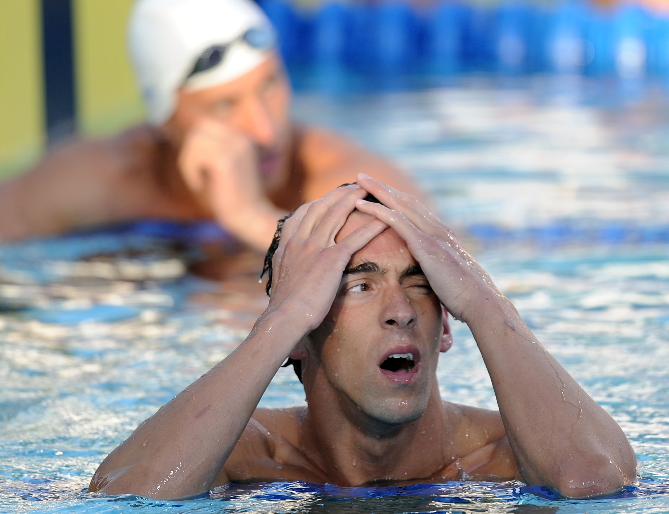 IRVINE, CA - AUGUST 07:  Michael Phelps reacts after his swim in the 200 LC Meter Backstroke Final during the 2010 ConocoPhillips National Championships at the William Woollett Jr. Aquatics Complex on August 7, 2010 in Irvine, California. Phelps finished