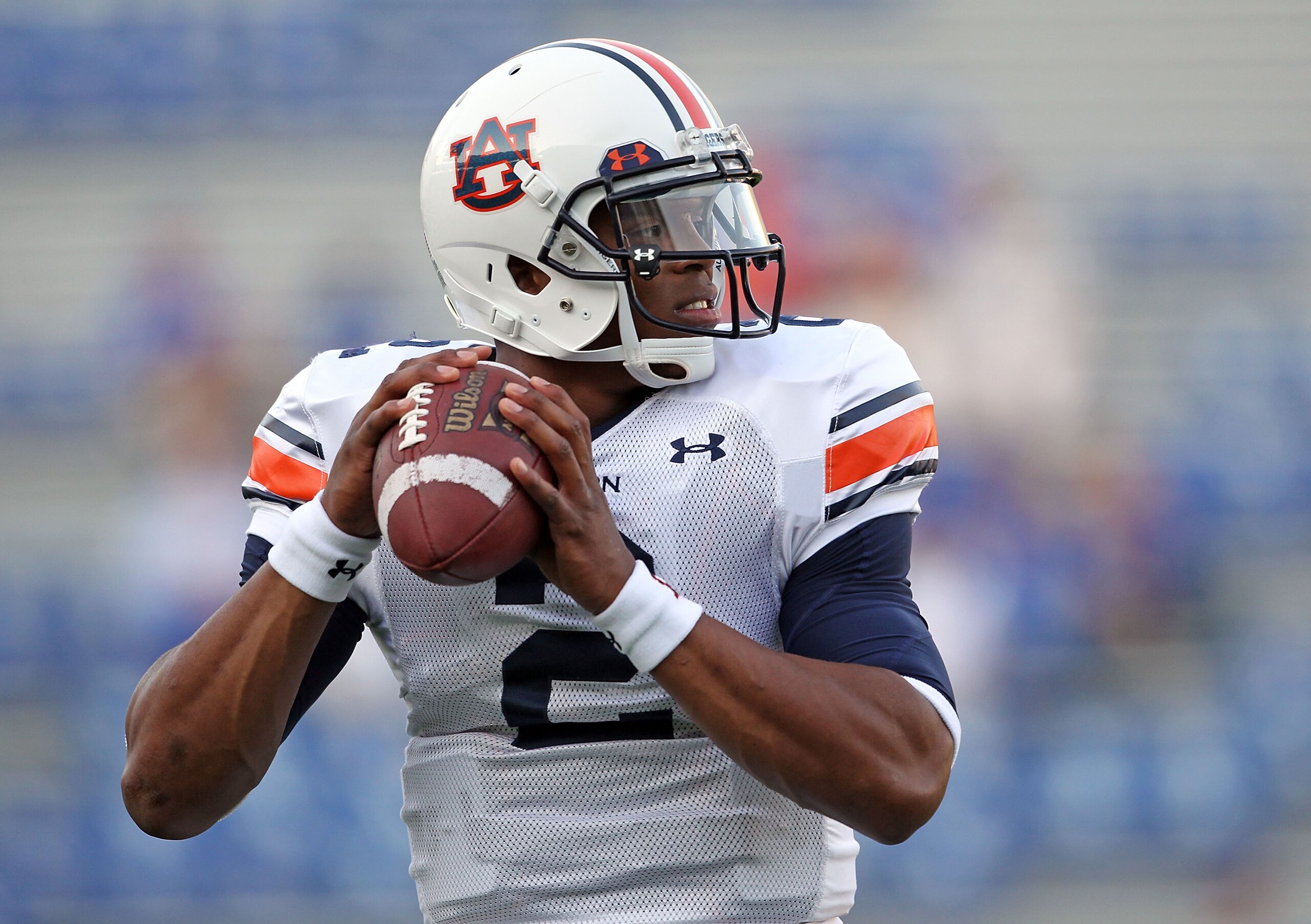 LEXINGTON, KY - OCTOBER 09:  Cam Newton #2 of the Auburn Tigers throws a pass as he warms up before the SEC game against the Kentucky Wildcats at Commonwealth Stadium on October 9, 2010 in Lexington, Kentucky.  (Photo by Andy Lyons/Getty Images)