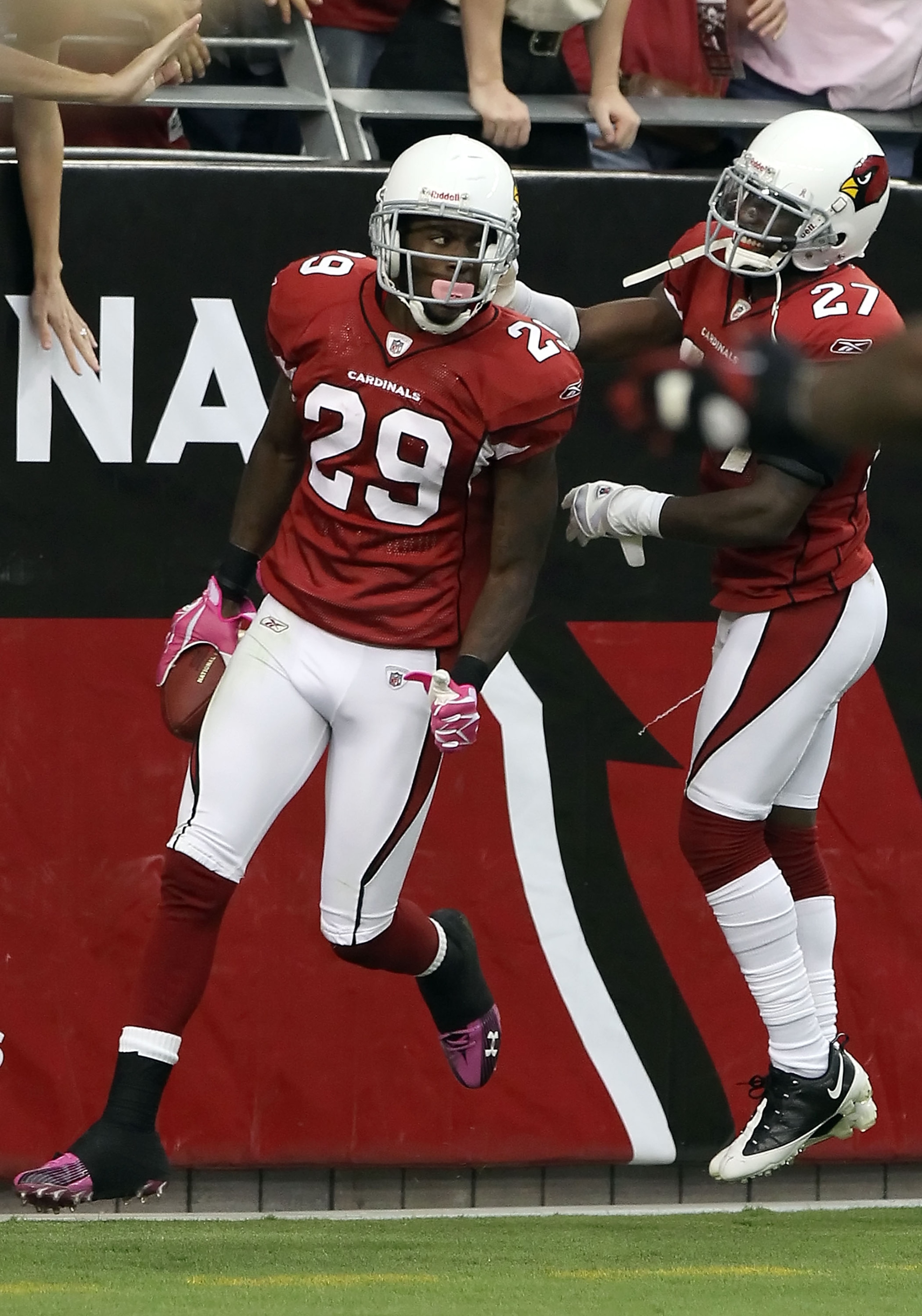 GLENDALE, AZ - OCTOBER 10:  Cornerback Dominique Rodgers-Cromartie #29 of the Arizona Cardinals celebrates with teammate Michael Adams #27 after scoring a touchdown on an interception during the fourth quarter of the NFL game against the New Orleans Saint