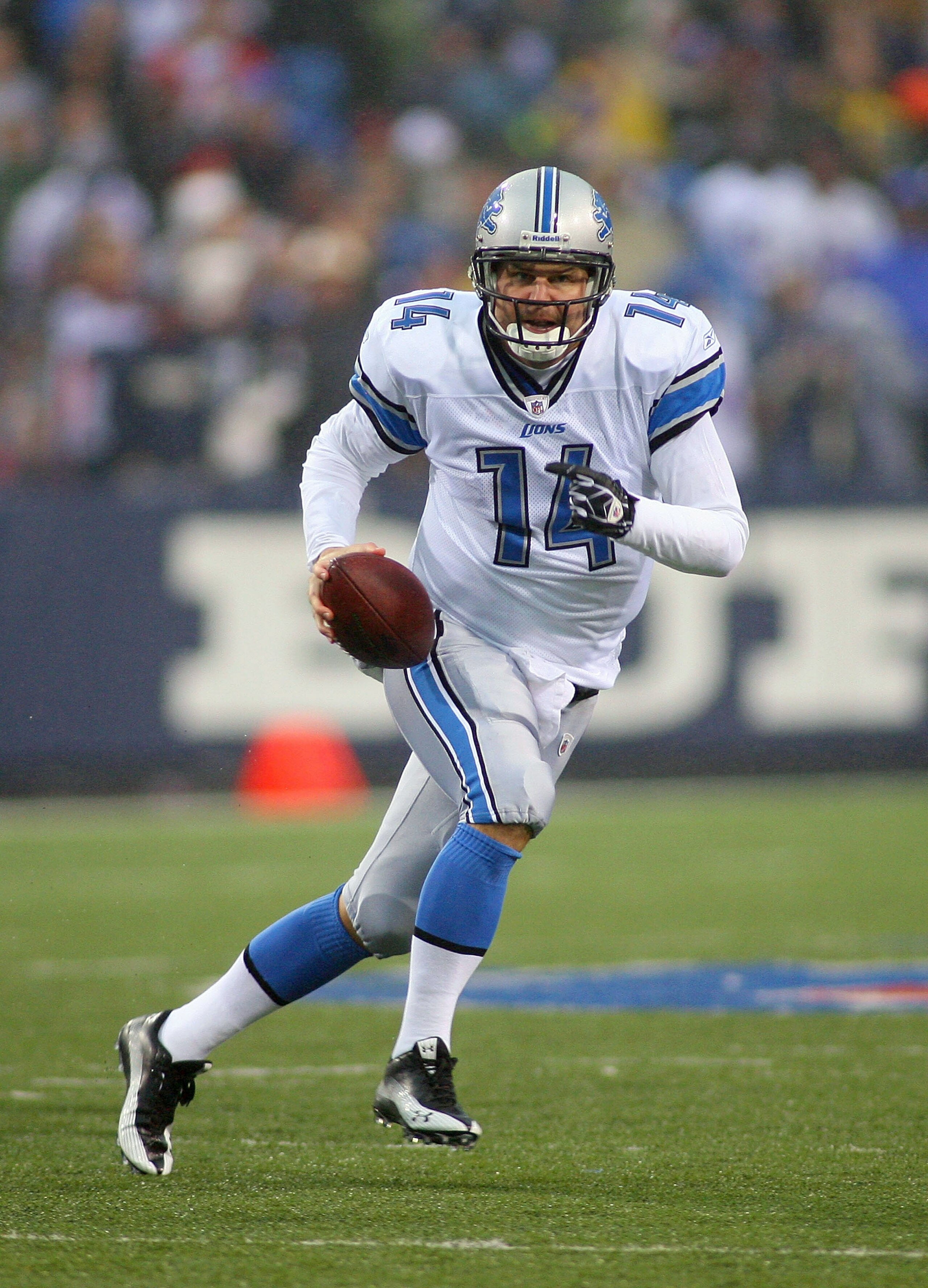 ORCHARD PARK, NY - NOVEMBER 14: Shaun Hill #14  of the Detroit Lions runs against the Buffalo Bills  at Ralph Wilson Stadium on November 14, 2010 in Orchard Park, New York. Buffalo won 14-12. (Photo by Rick Stewart/Getty Images)