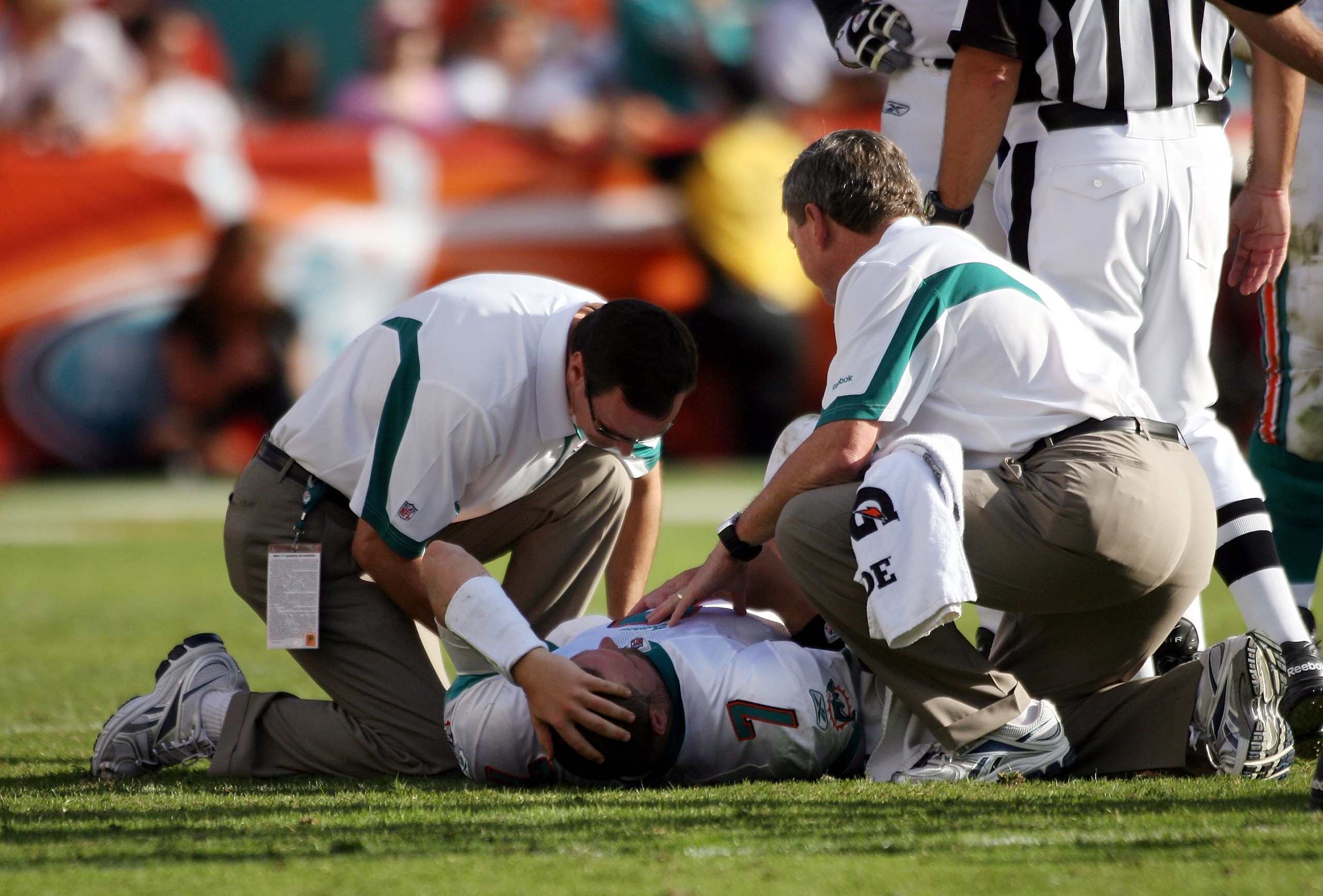 MIAMI - NOVEMBER 14: Quarterback Chad Henne #7 of the Miami Dolphins is helped on the field against the Tennessee Titans at Sun Life Stadium on November 14, 2010 in Miami, Florida. (Photo by Marc Serota/Getty Images) MIAMI - NOVEMBER 14: Quarterback Chad Henne #7 of the Miami Dolphins is helped on the field against the Tennessee Titans at Sun Life Stadium on November 14, 2010 in Miami, Florida. (Photo by Marc Serota/Getty Images)