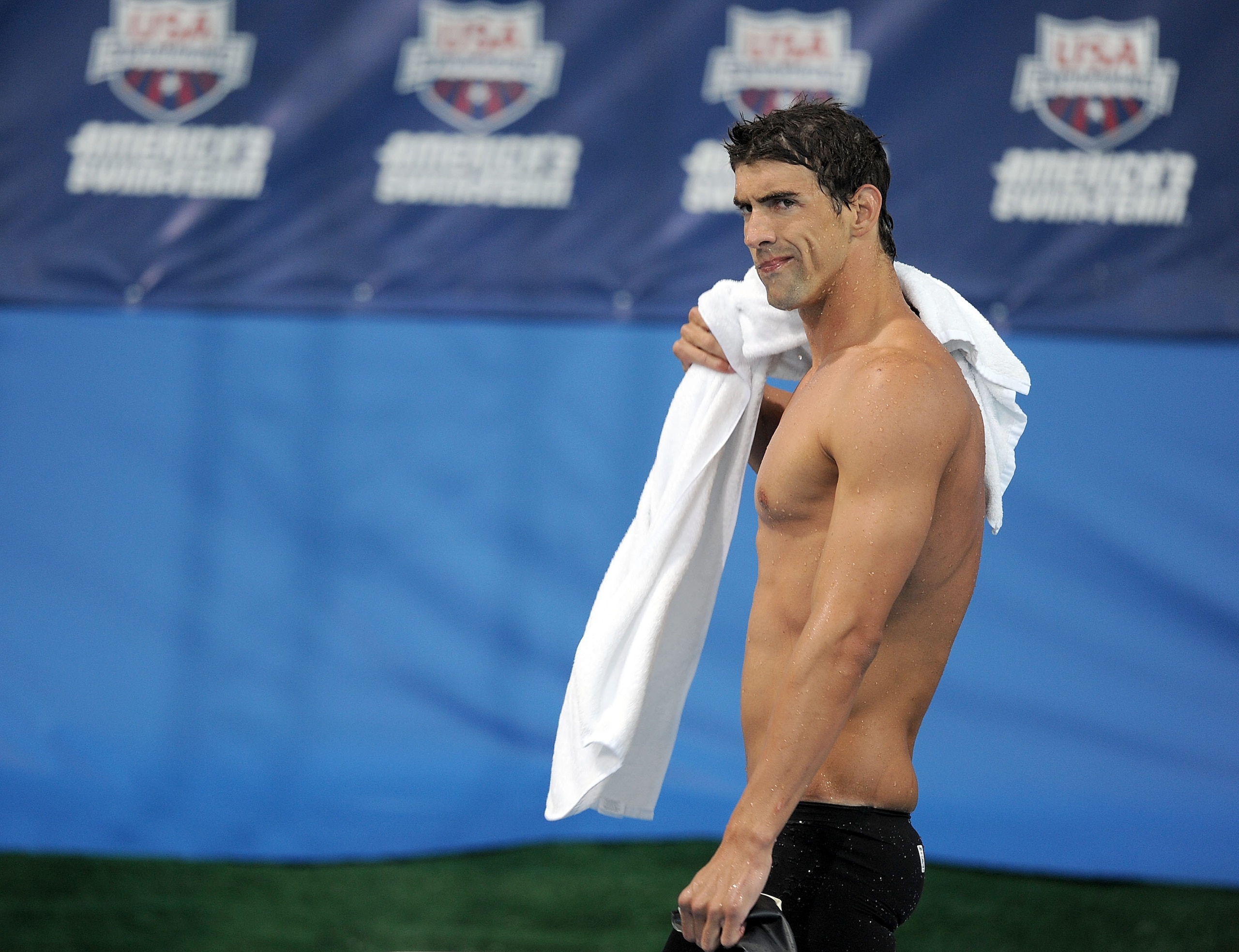 IRVINE, CA - AUGUST 04:  Michael Phelps reacts after his win in the Men 200 LC Meter Butterfly Final at the William Woollett Jr. Aquatics Complex on August 4, 2010 in Irvine, California.  (Photo by Harry How/Getty Images)