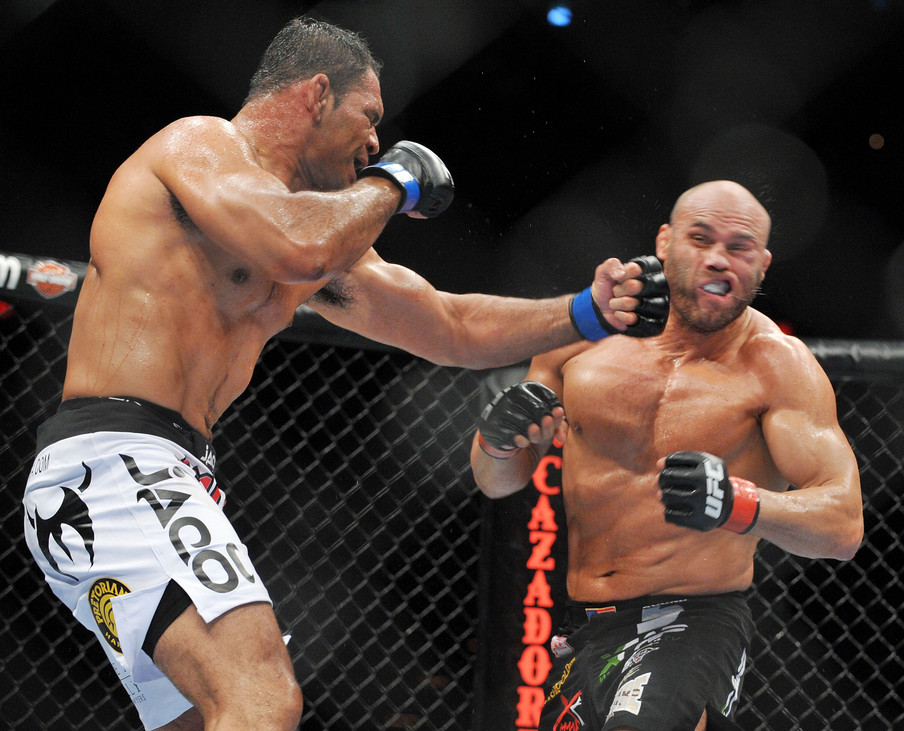 PORTLAND, OR - AUGUST 29:  UFC fighter Antonio Nogueira (L) battles UFC fighter Randy Couture (R) during their Heavyweight bout at UFC 102:  Couture vs. Nogueira at the Rose Garden Arena on August 29, 2009 in Portland, Oregon.  (Photo by Jon Kopaloff/Gett