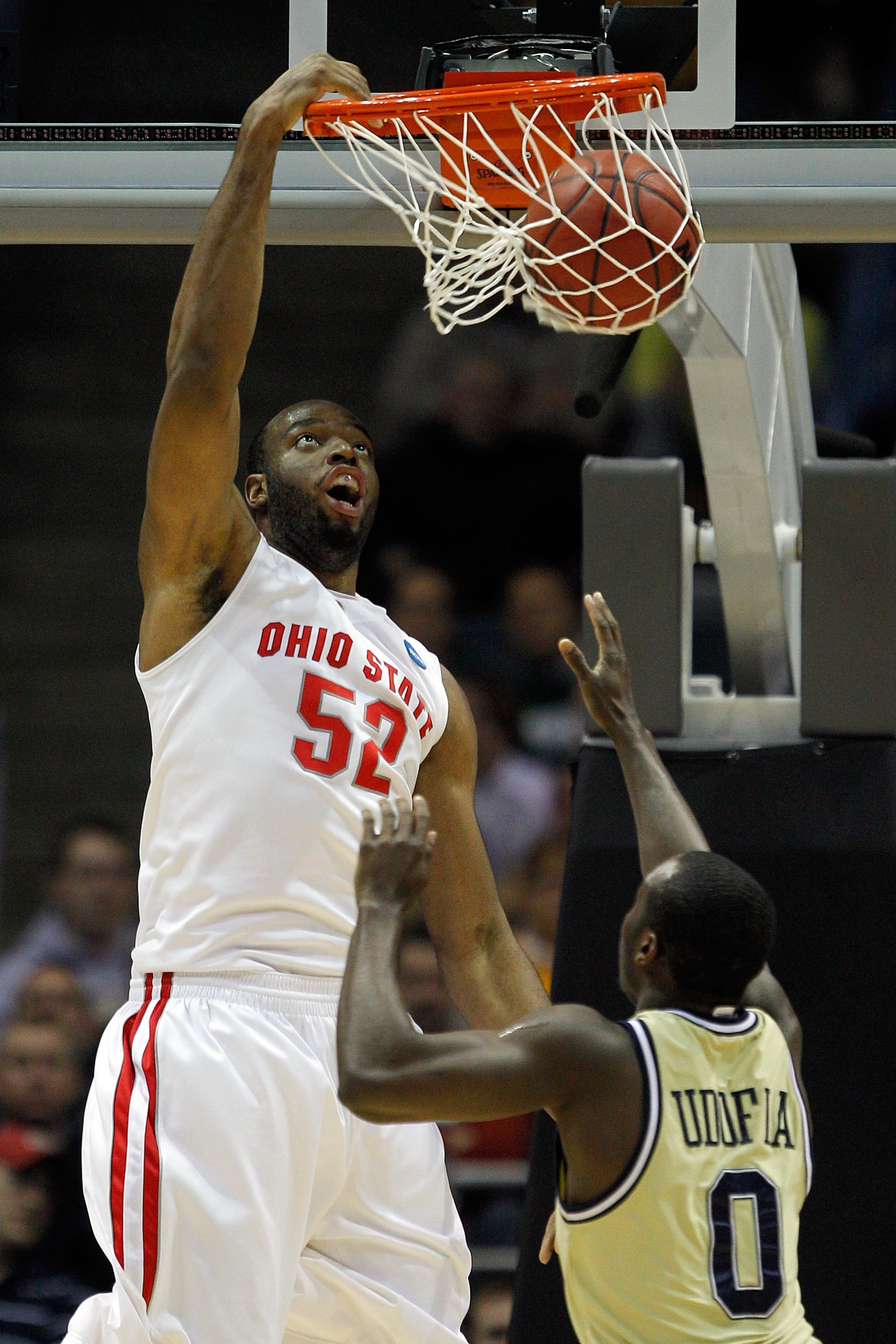MILWAUKEE - MARCH 21:  Dallas Lauderdale #52 of the Ohio State Buckeyes dunks the ball over Mfon Udofia #0 of the Georgia Tech Yellow Jackets in the first half during the second round of the 2010 NCAA men's basketball tournament at the Bradley Center on M