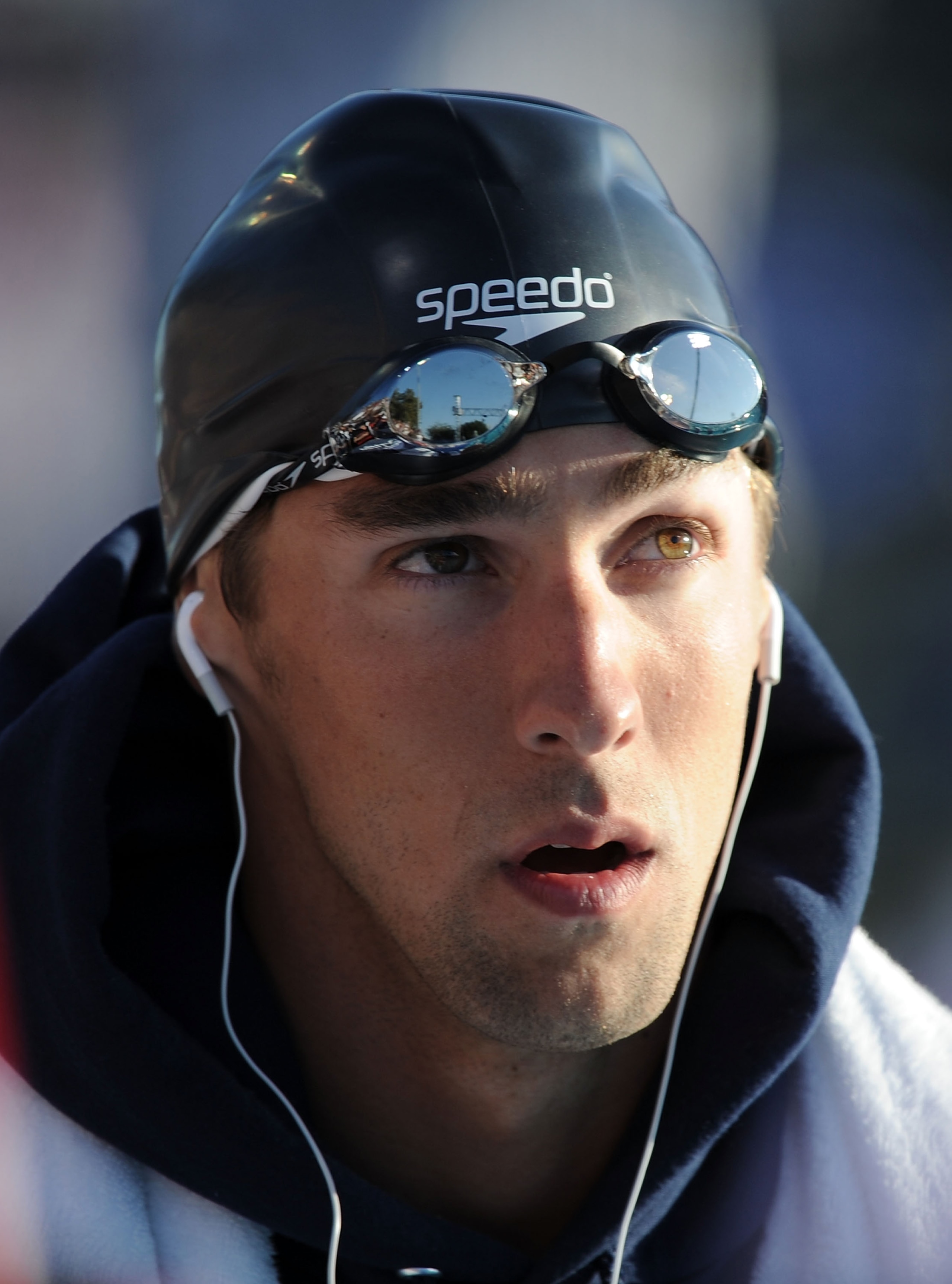 IRVINE, CA - AUGUST 05:  Michael Phelps on his way to race in the Men 100 LC Meter Butterfly Final at the William Woollett Jr. Aquatics Complex on August 5, 2010 in Irvine, California.  (Photo by Harry How/Getty Images)