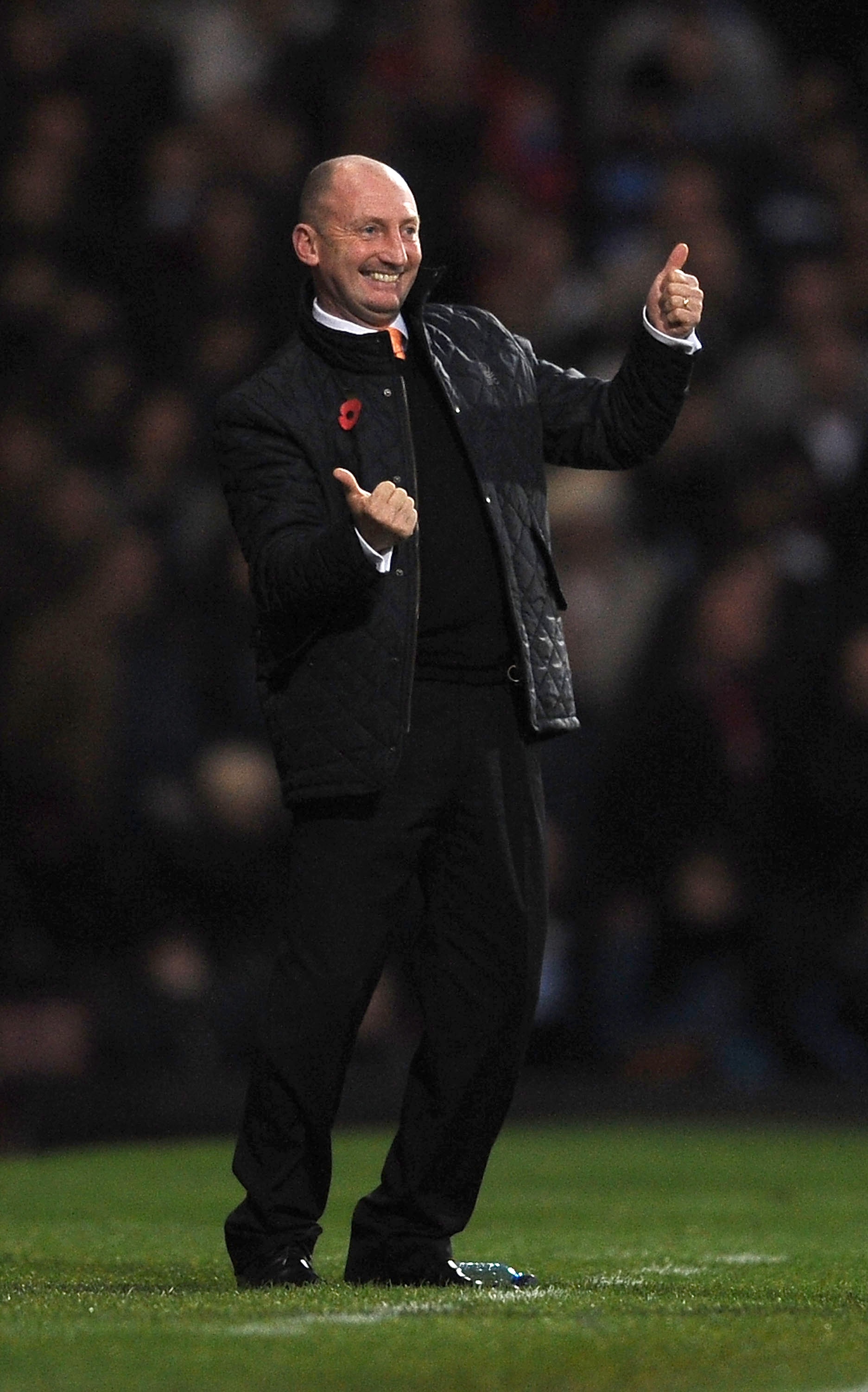 LONDON, ENGLAND - NOVEMBER 13:  Manager Ian Holloway of Blackpool seems to joke about smiling during the Barclays Premier League match between West Ham United and Blackpool at Boleyn Ground on November 13, 2010 in London, England.  (Photo by Christopher L