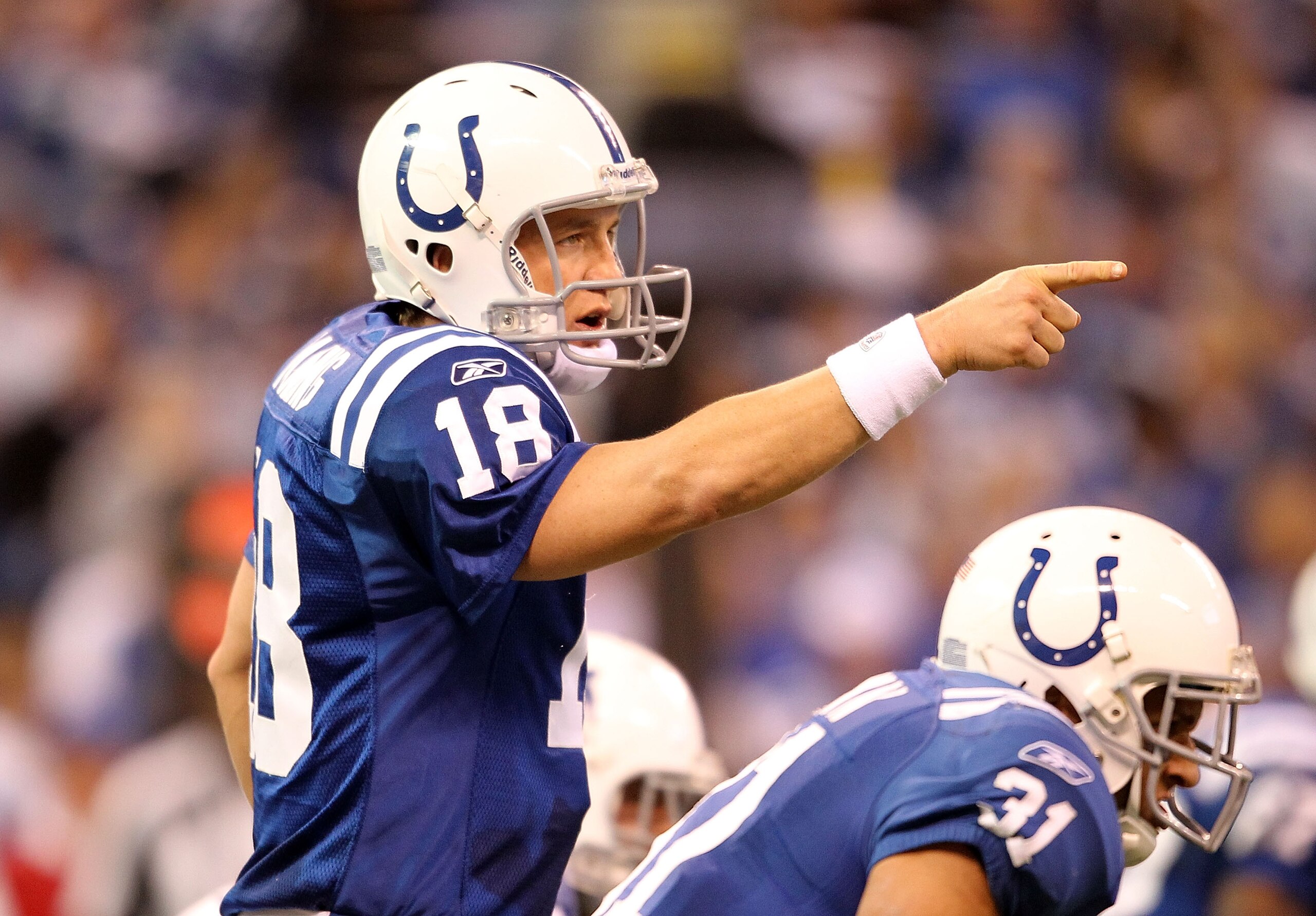 INDIANAPOLIS - NOVEMBER 14:  Peyton Manning #18 of the Indianapolis Colts gives instructions to his team during the NFL game against the Cincinnati Bengals at Lucas Oil Stadium on November 14, 2010 in Indianapolis, Indiana. The Colts won 23-17.  (Photo by