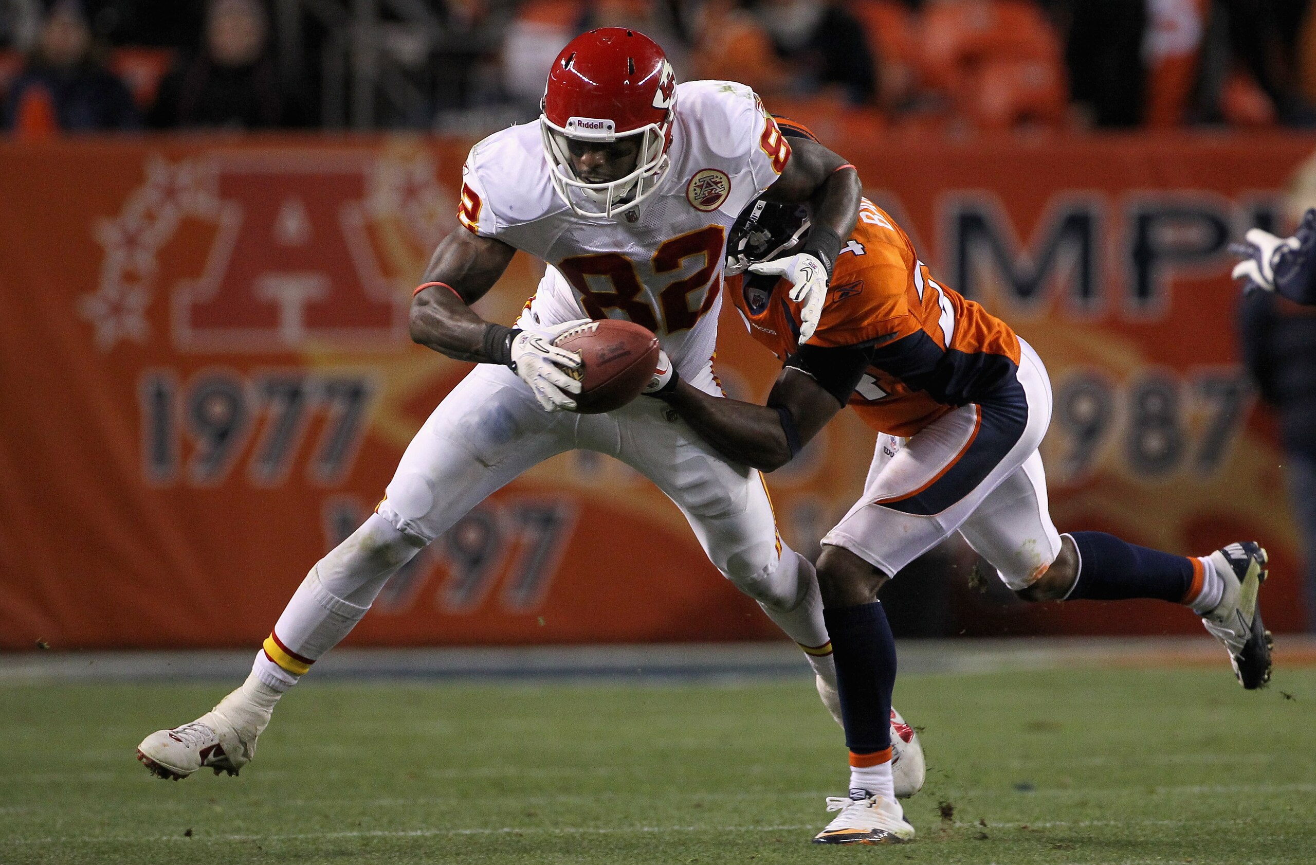 DENVER - NOVEMBER 14:  Wide receiver Dwayne Bowe #82 of the Kansas City Chiefs makes a reception as Champ Bailey #24 of the Denver Bronco defends at INVESCO Field at Mile High on November 14, 2010 in Denver, Colorado. The Broncos defeated the Cheifs 49-29