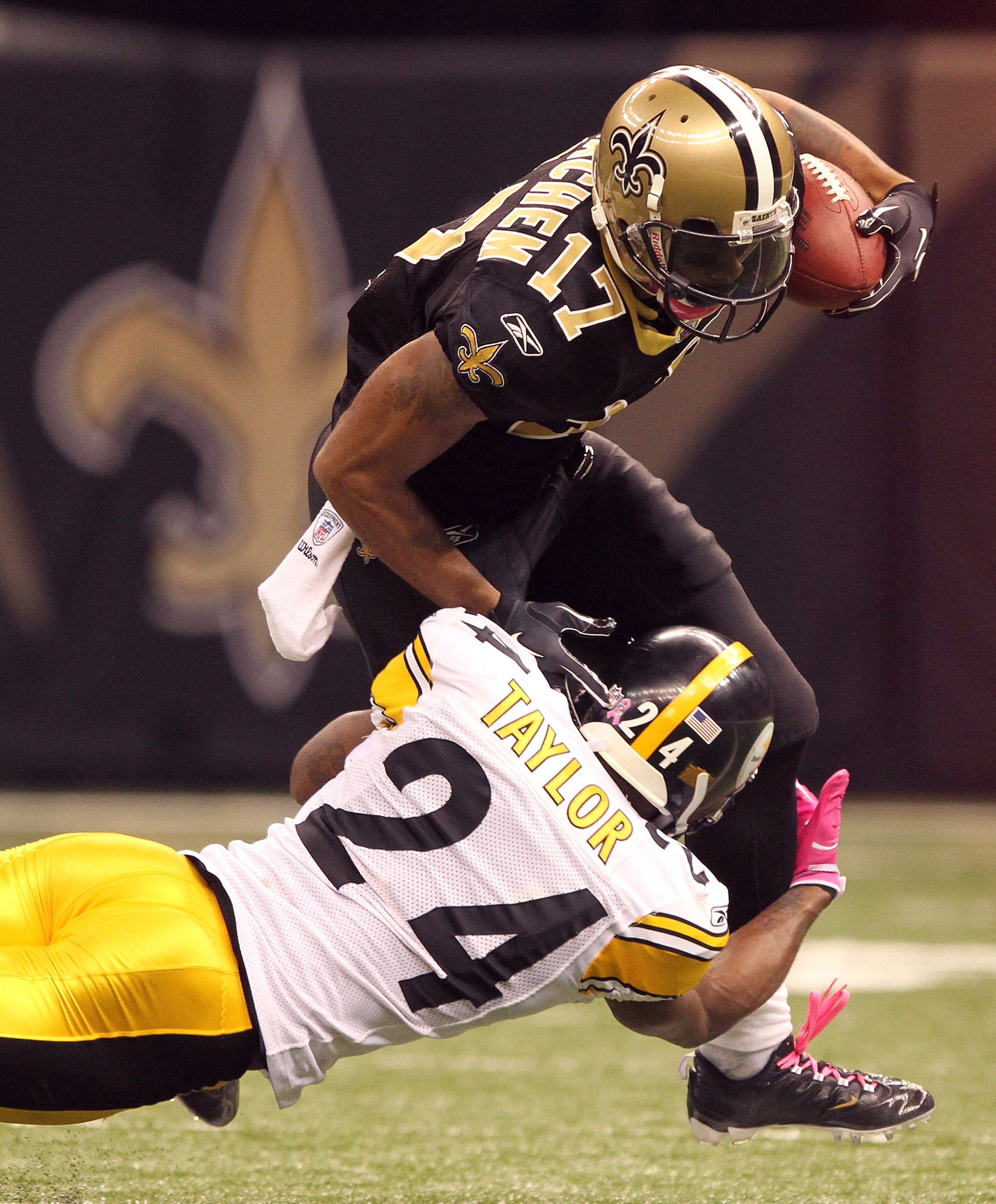NEW ORLEANS - OCTOBER 31: Robert Meachem #17 of the New Orleans Saints is tackled by Ike Taylor #24 of the Pittsburgh Steelers at the Louisiana Superdome on October 31, 2010 in New Orleans, Louisiana. (Photo by Matthew Sharpe/Getty Images) NEW ORLEANS - OCTOBER 31: Robert Meachem #17 of the New Orleans Saints is tackled by Ike Taylor #24 of the Pittsburgh Steelers at the Louisiana Superdome on October 31, 2010 in New Orleans, Louisiana. (Photo by Matthew Sharpe/Getty Images)