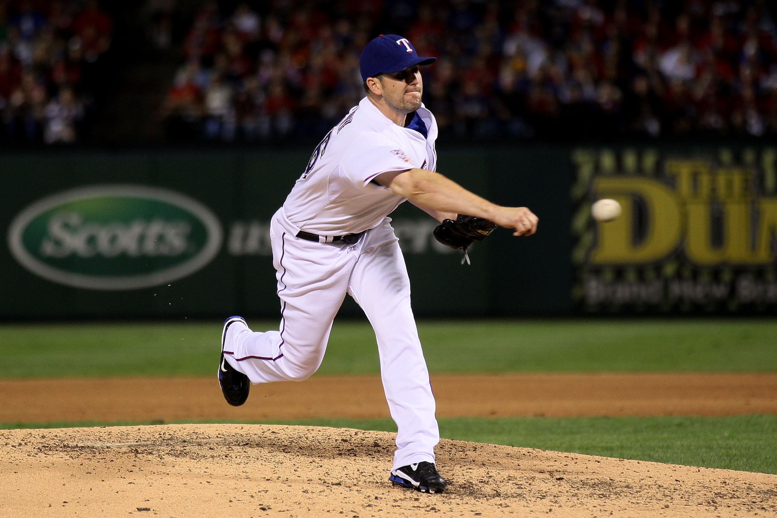 ARLINGTON, TX - OCTOBER 31:  Darren O'Day #56 of the Texas Rangers pitches against the San Francisco Giants in Game Four of the 2010 MLB World Series at Rangers Ballpark in Arlington on October 31, 2010 in Arlington, Texas.  (Photo by Elsa/Getty Images)