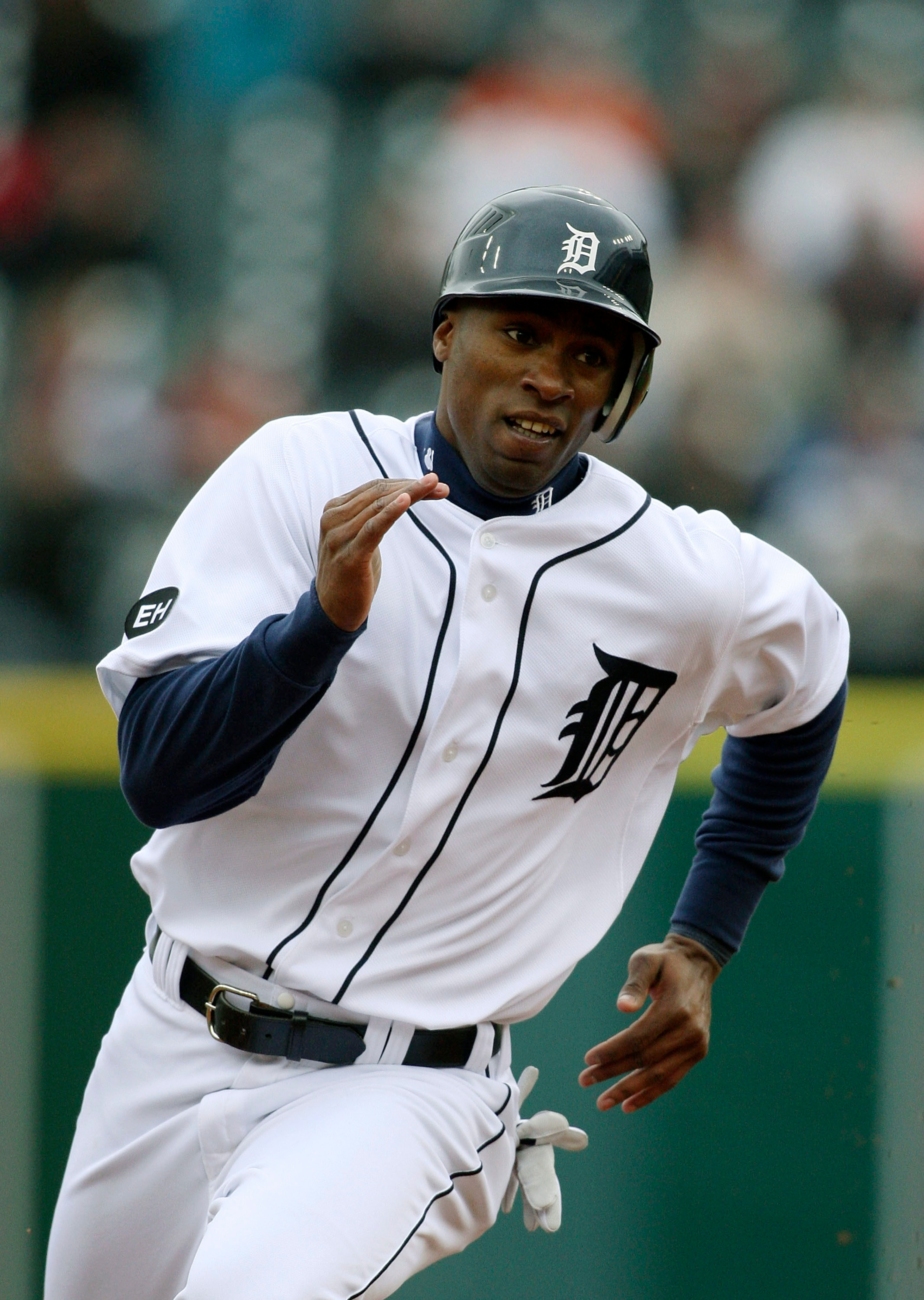DETROIT - MAY 12:  Austin Jackson #14 of the Detroit Tigers heads to third base on a singles to right field off the bat of Johnny Damon #14 (not in photo) in the sixth inning against the New York Yankees during the game on May 12, 2010 at Comerica Park in